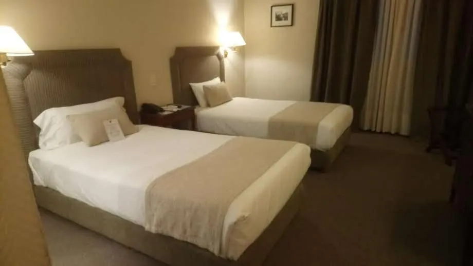 Bed in Lafayette Hotel