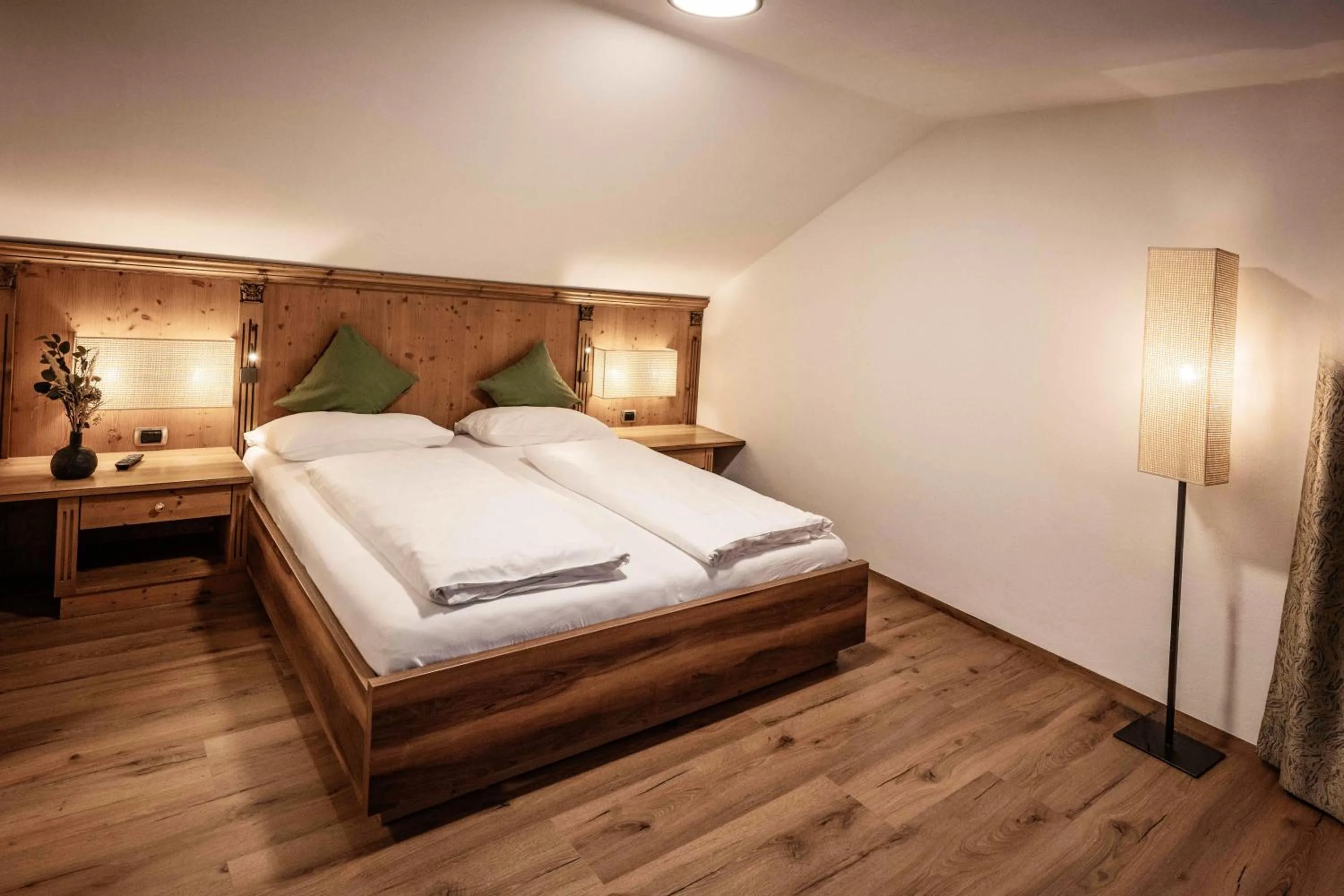 Bed in Active Hotel Sonne