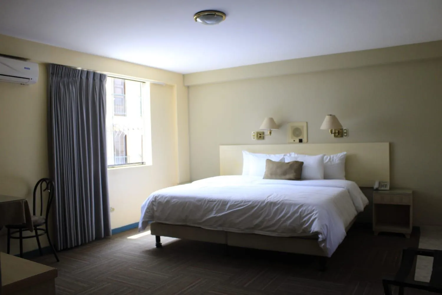 Bed in Embajadores Hotel