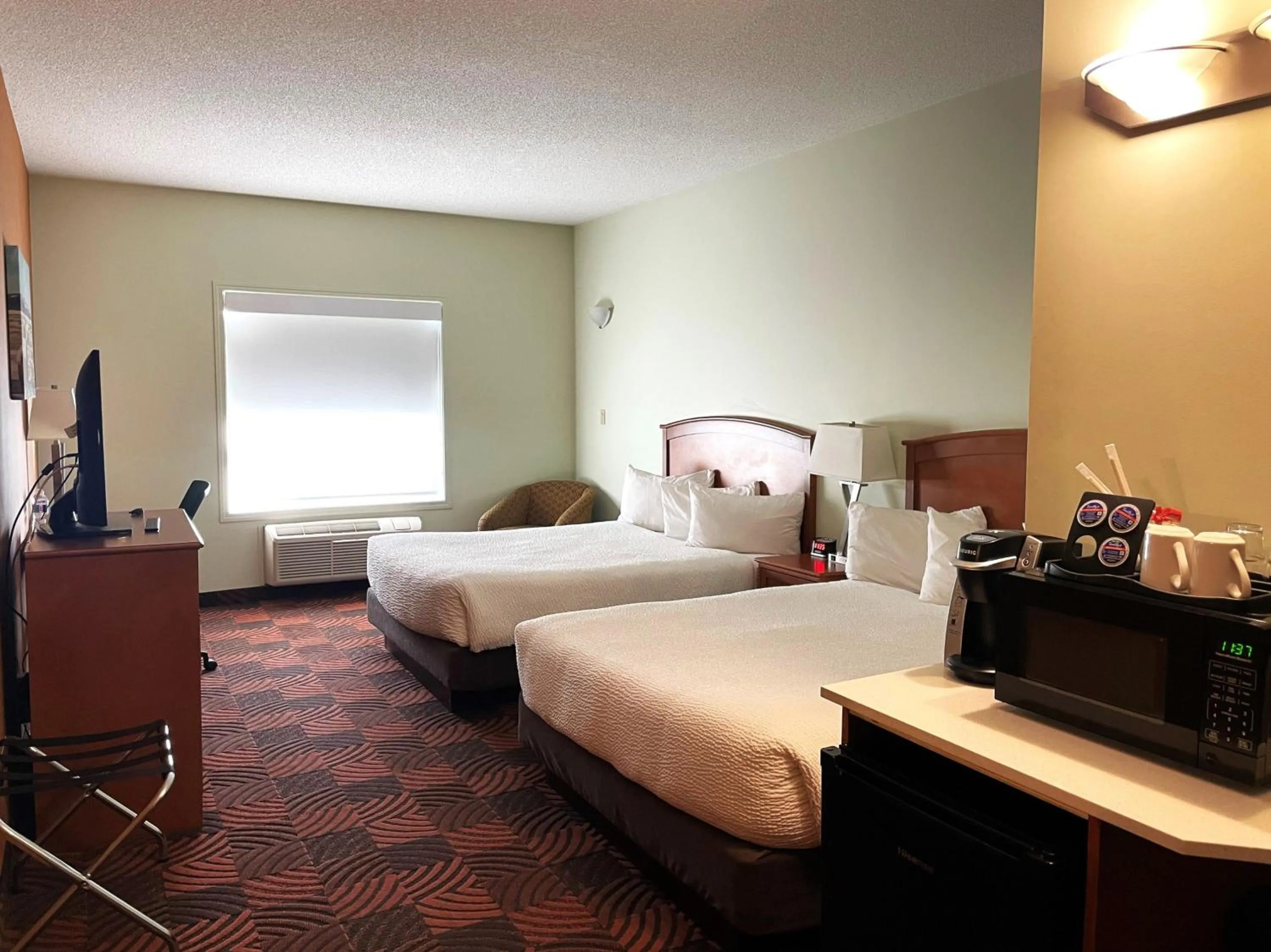 Bed in Service Plus Inns and Suites Calgary