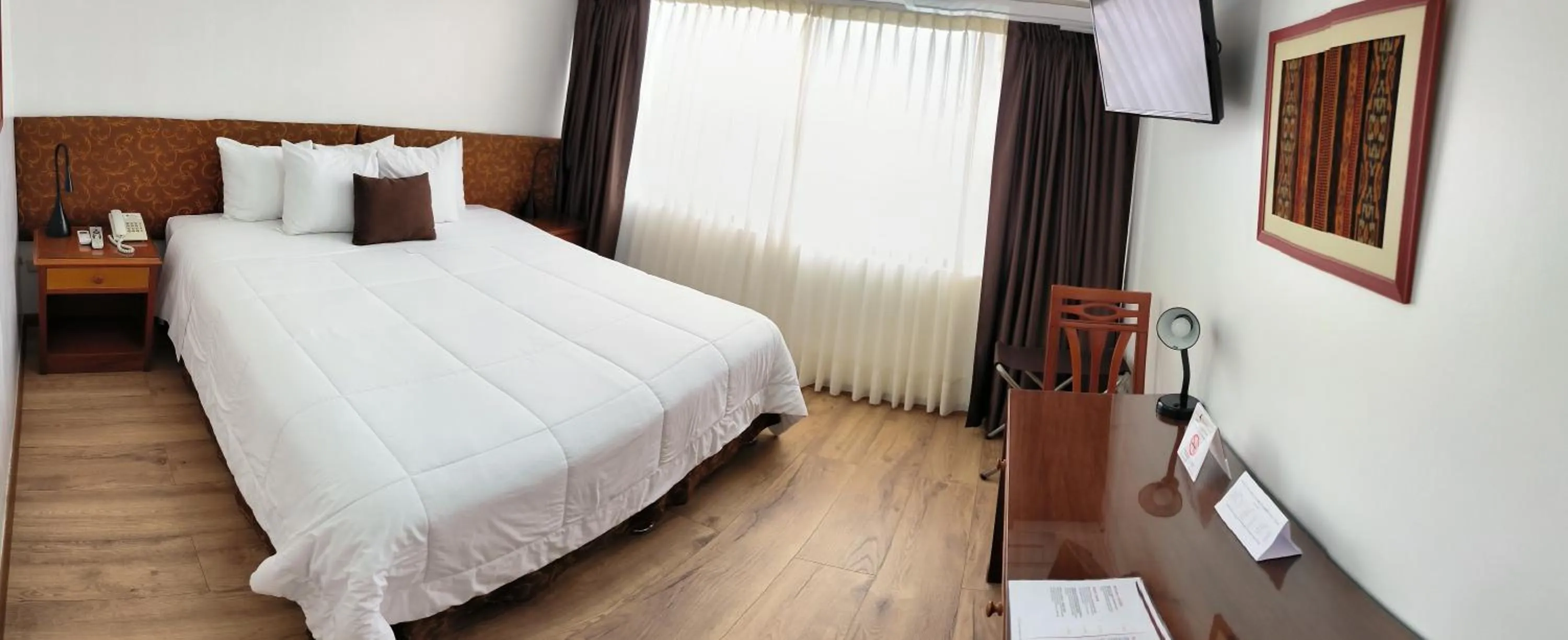 Bed in Faraona Grand Hotel