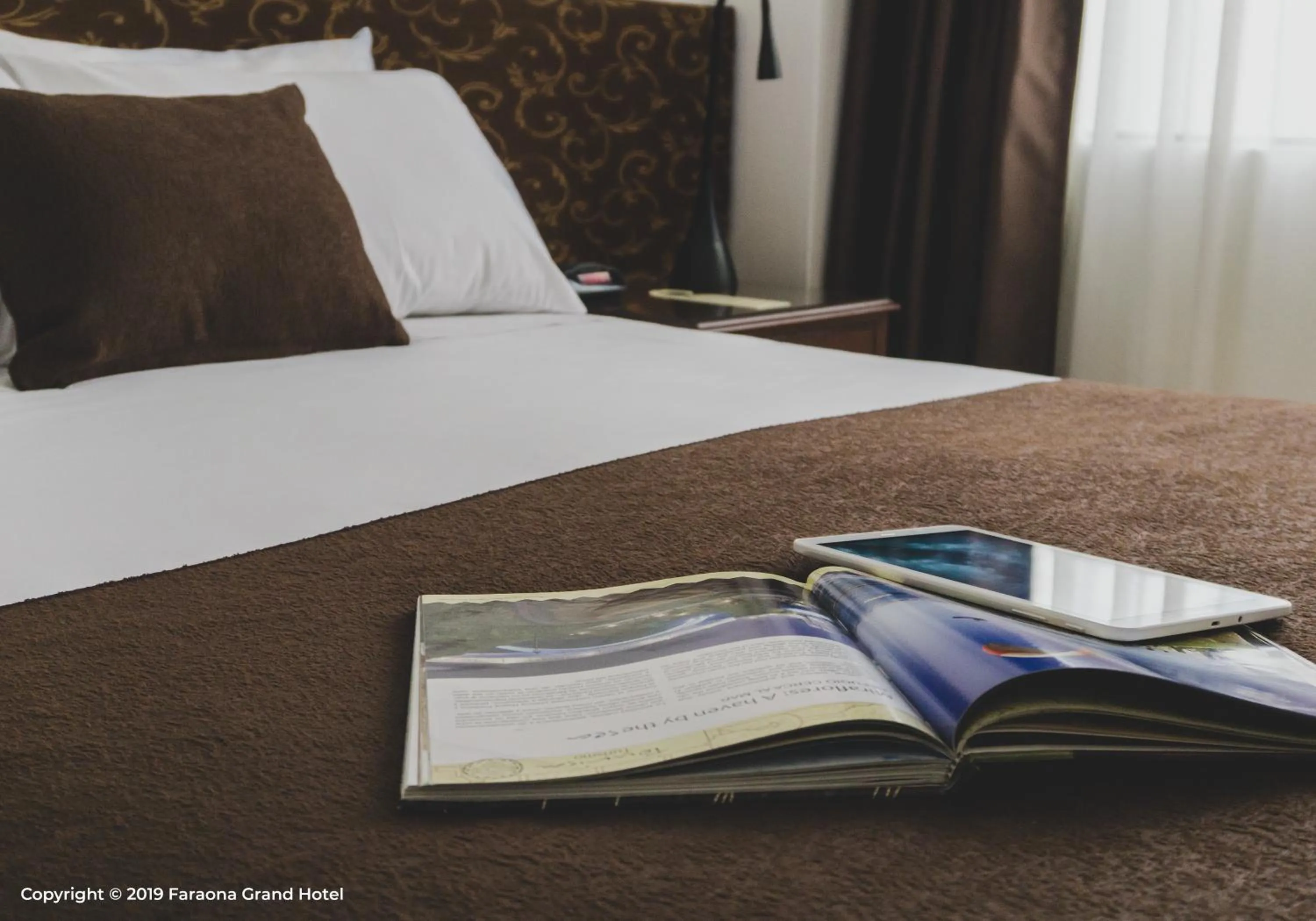 Bed in Faraona Grand Hotel