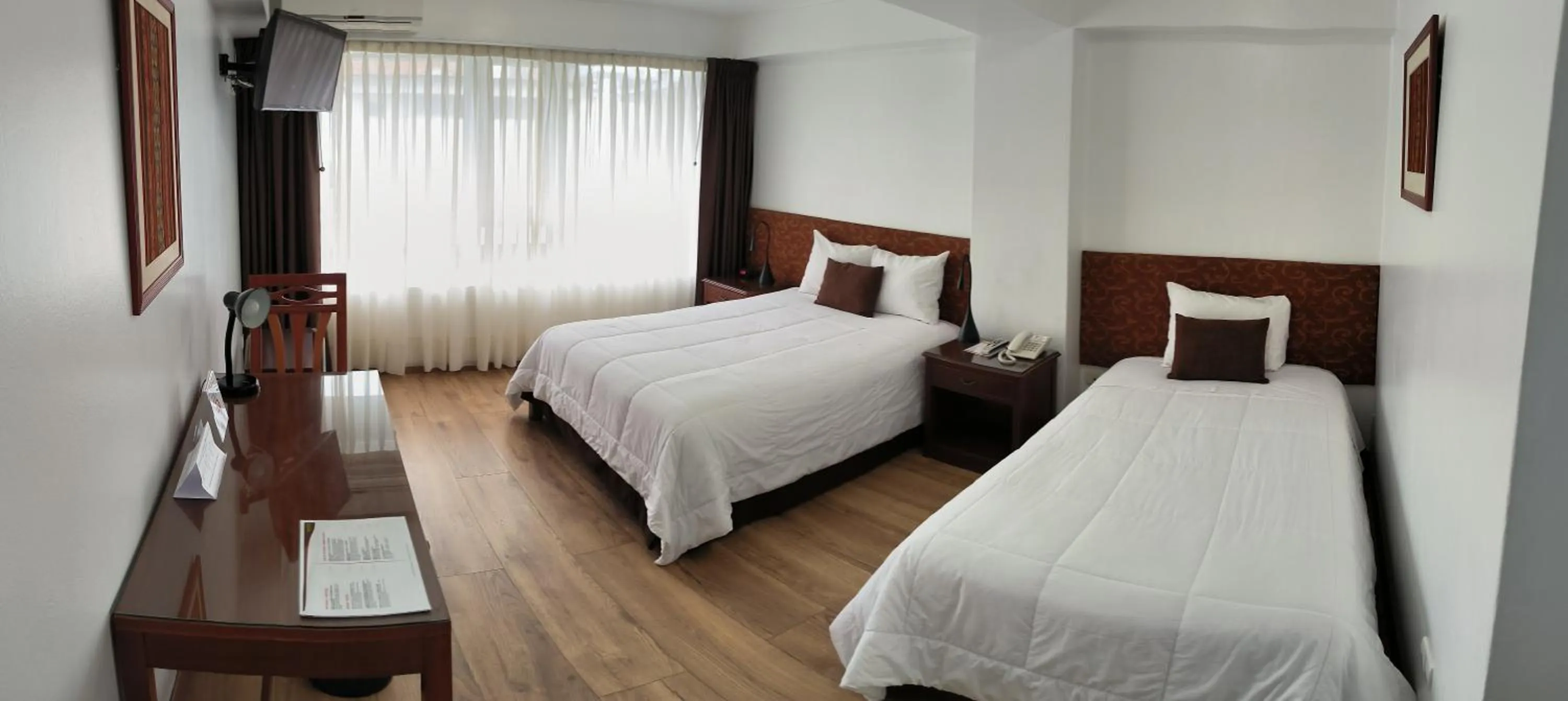 Bed in Faraona Grand Hotel