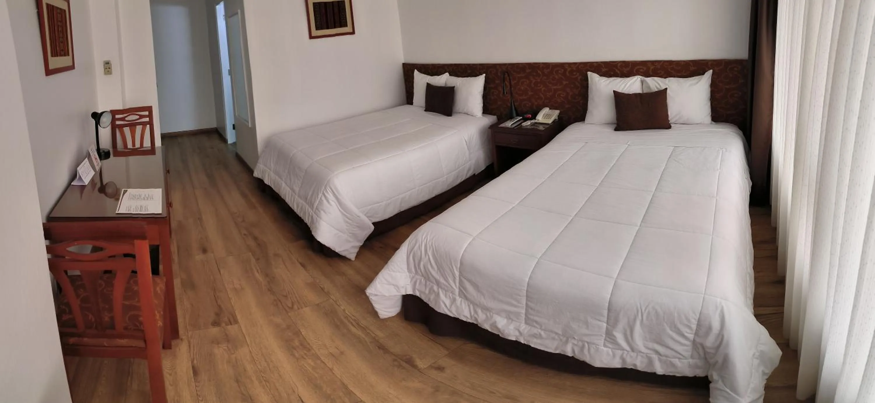 Bed in Faraona Grand Hotel