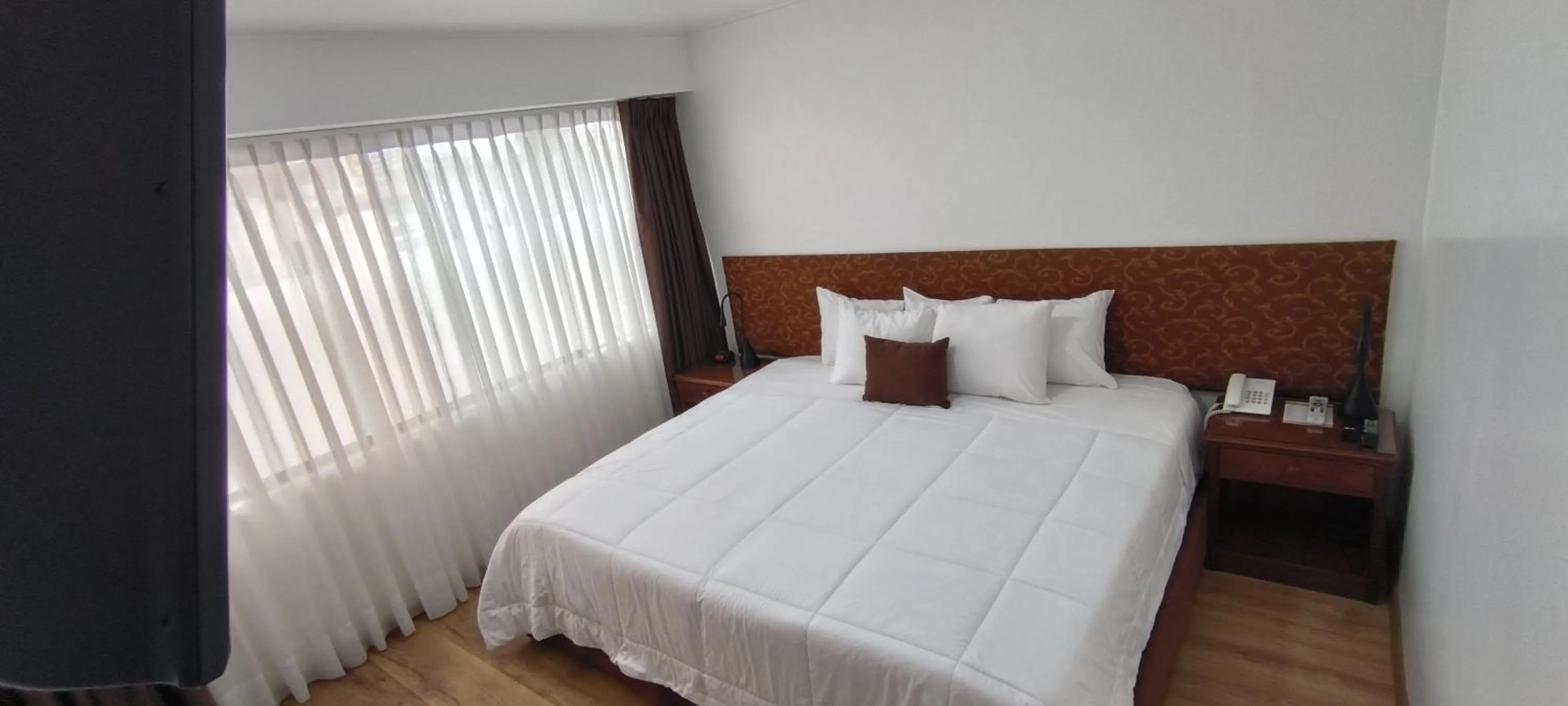 Bed in Faraona Grand Hotel