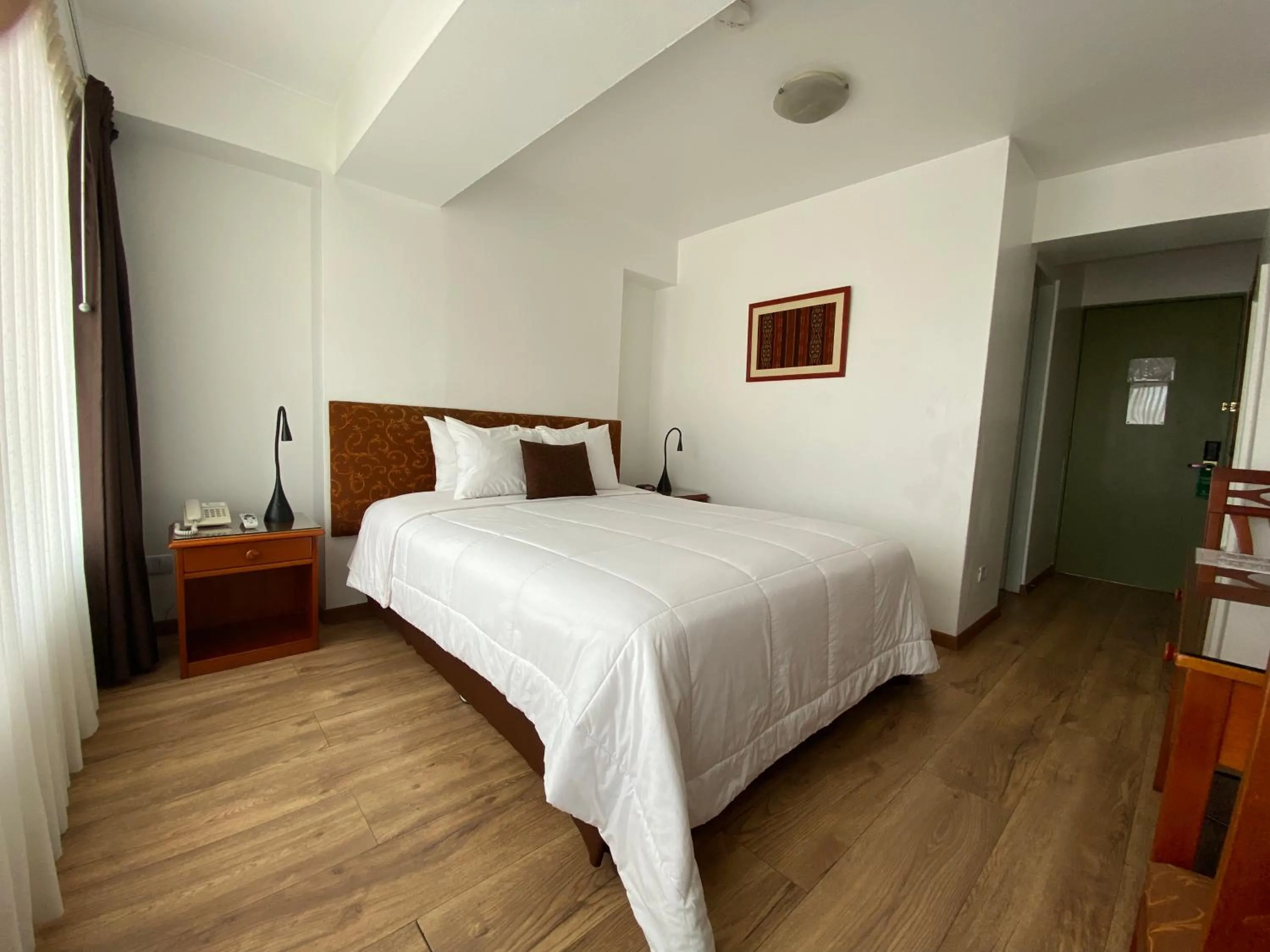 Bed in Faraona Grand Hotel