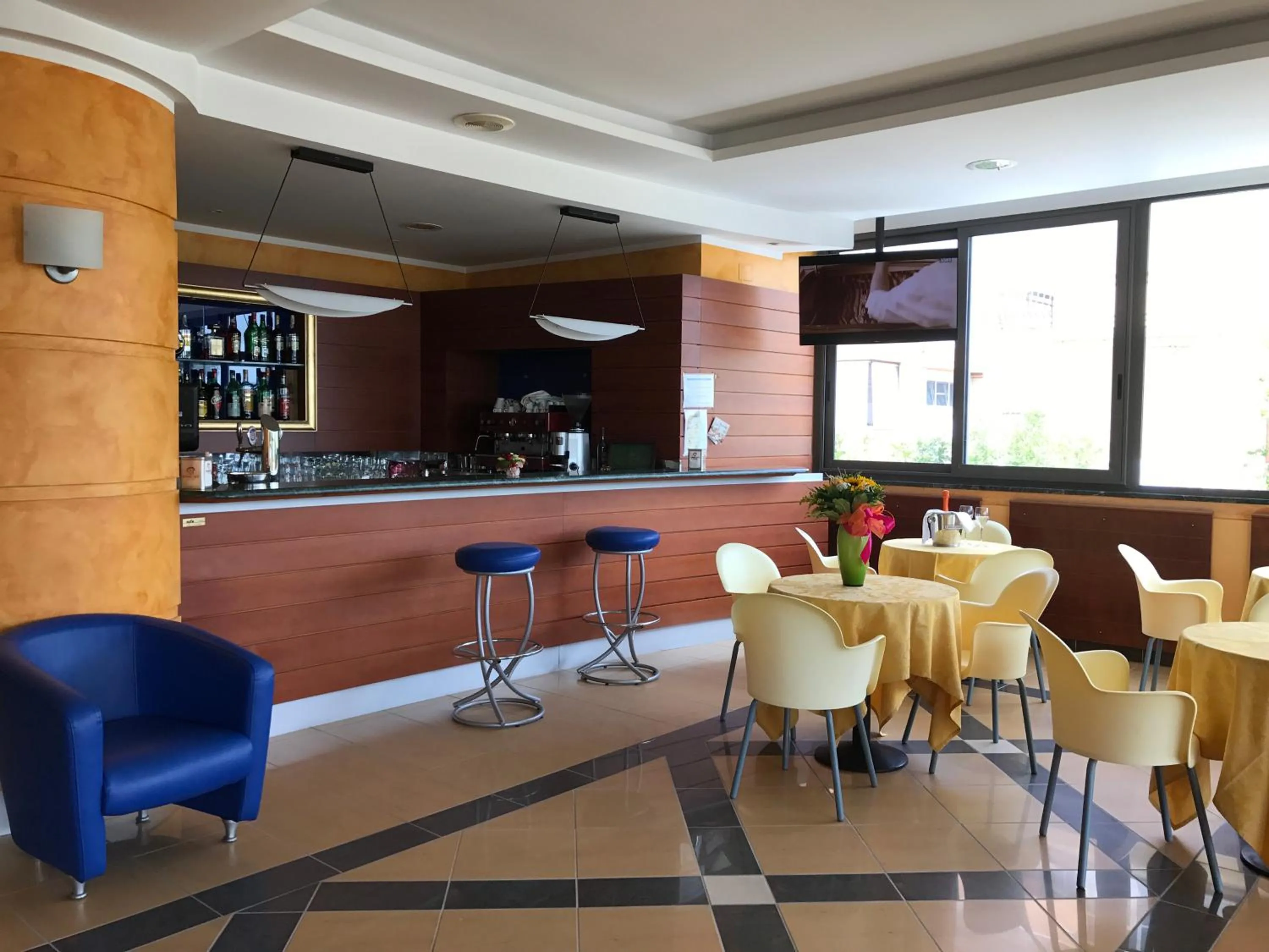 Communal lounge/ TV room in Hotel Atlas