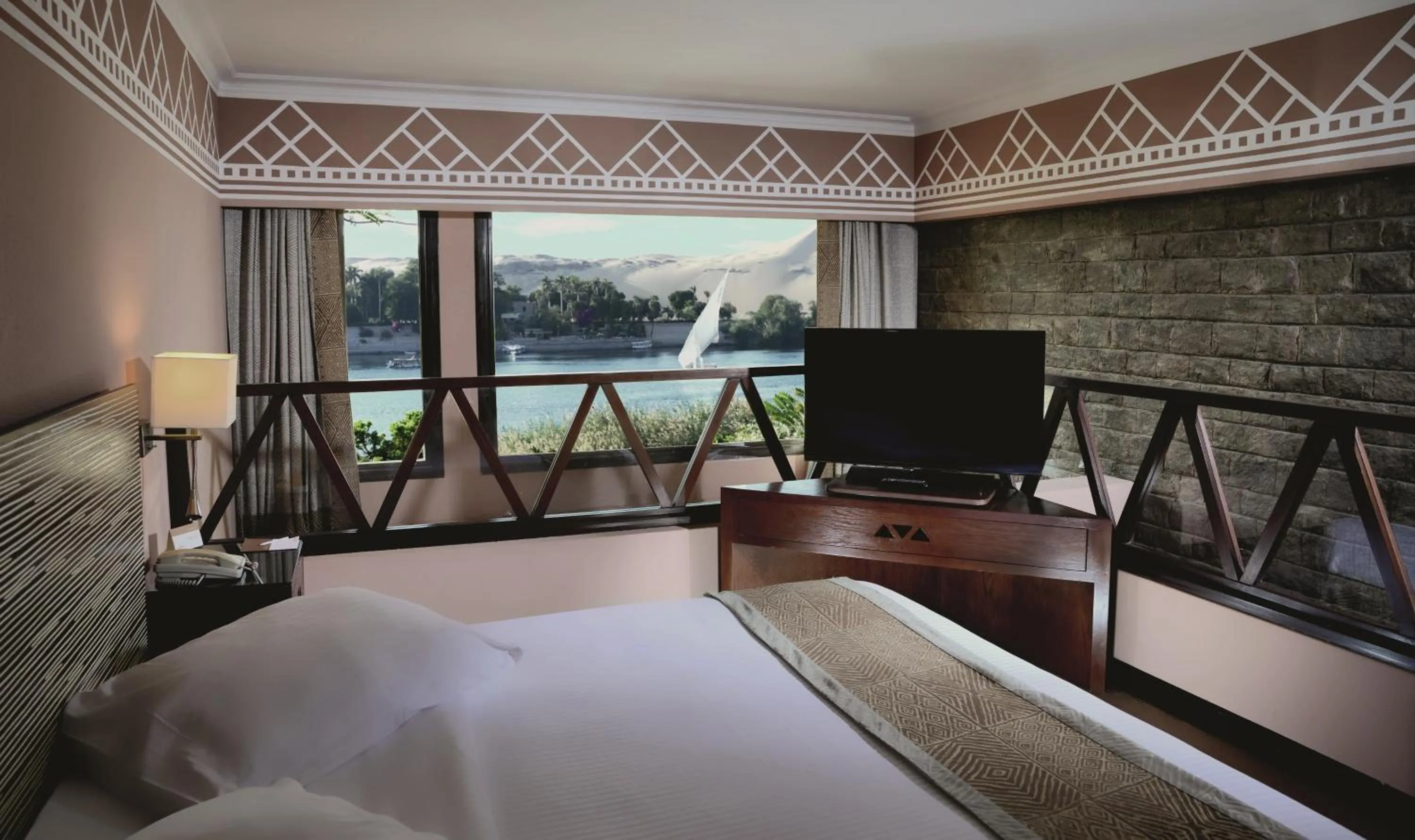 Bed in Mövenpick Resort Aswan