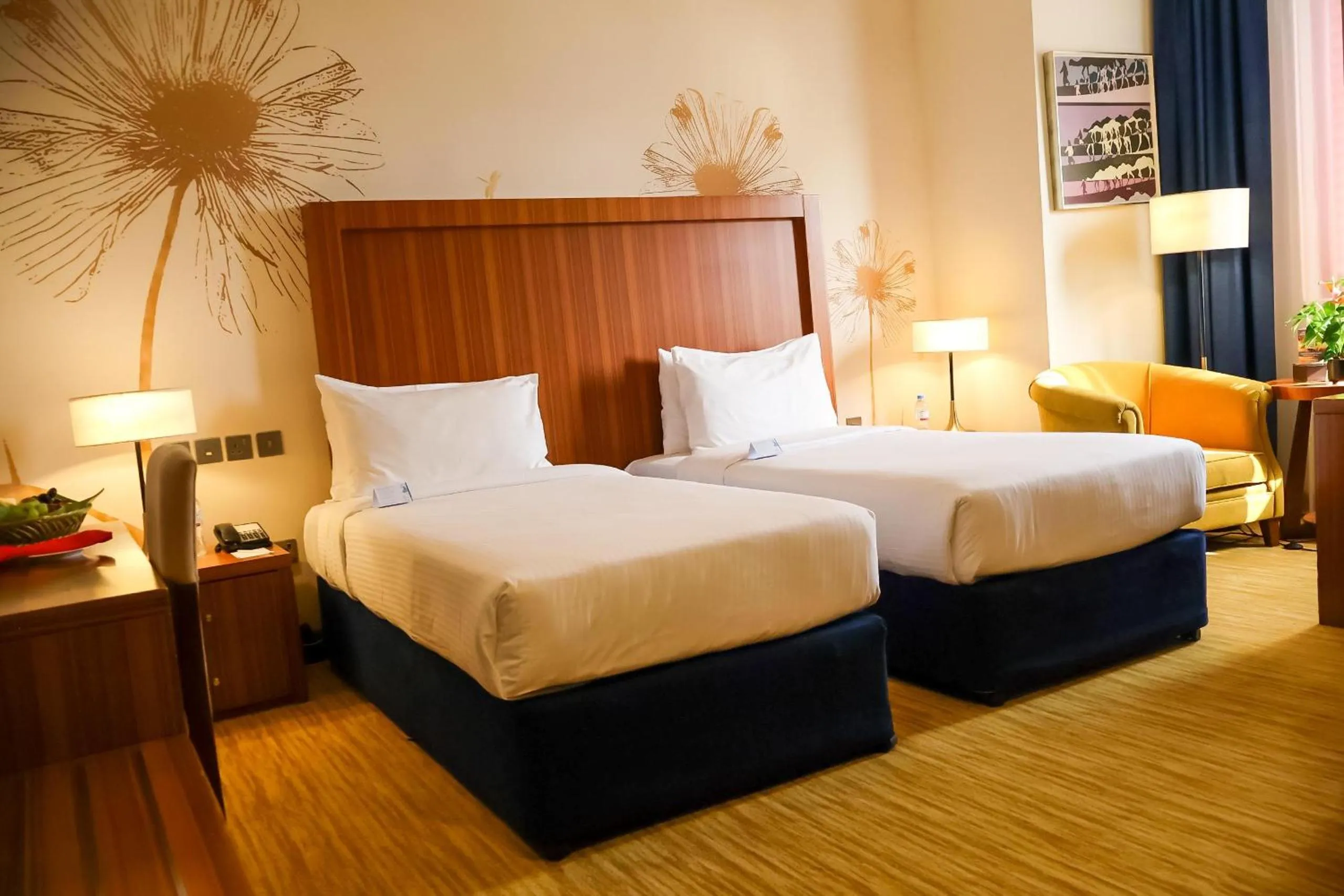 Bed in City Seasons Al Hamra Hotel
