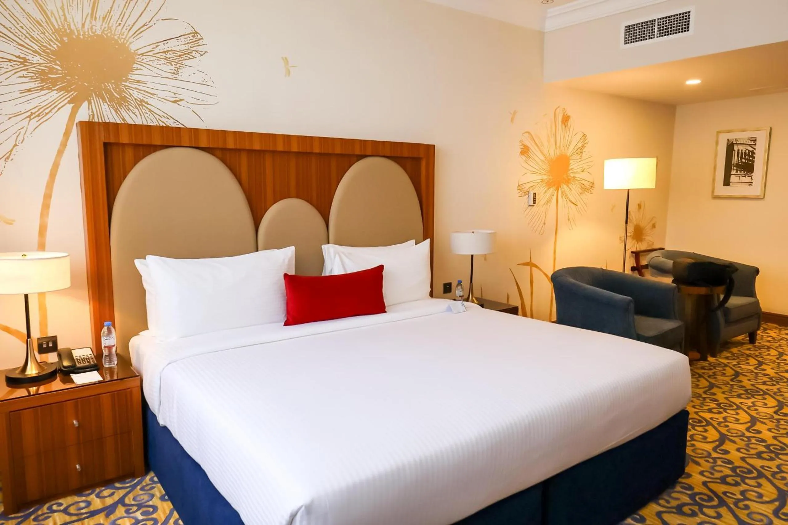 Bed in City Seasons Al Hamra Hotel