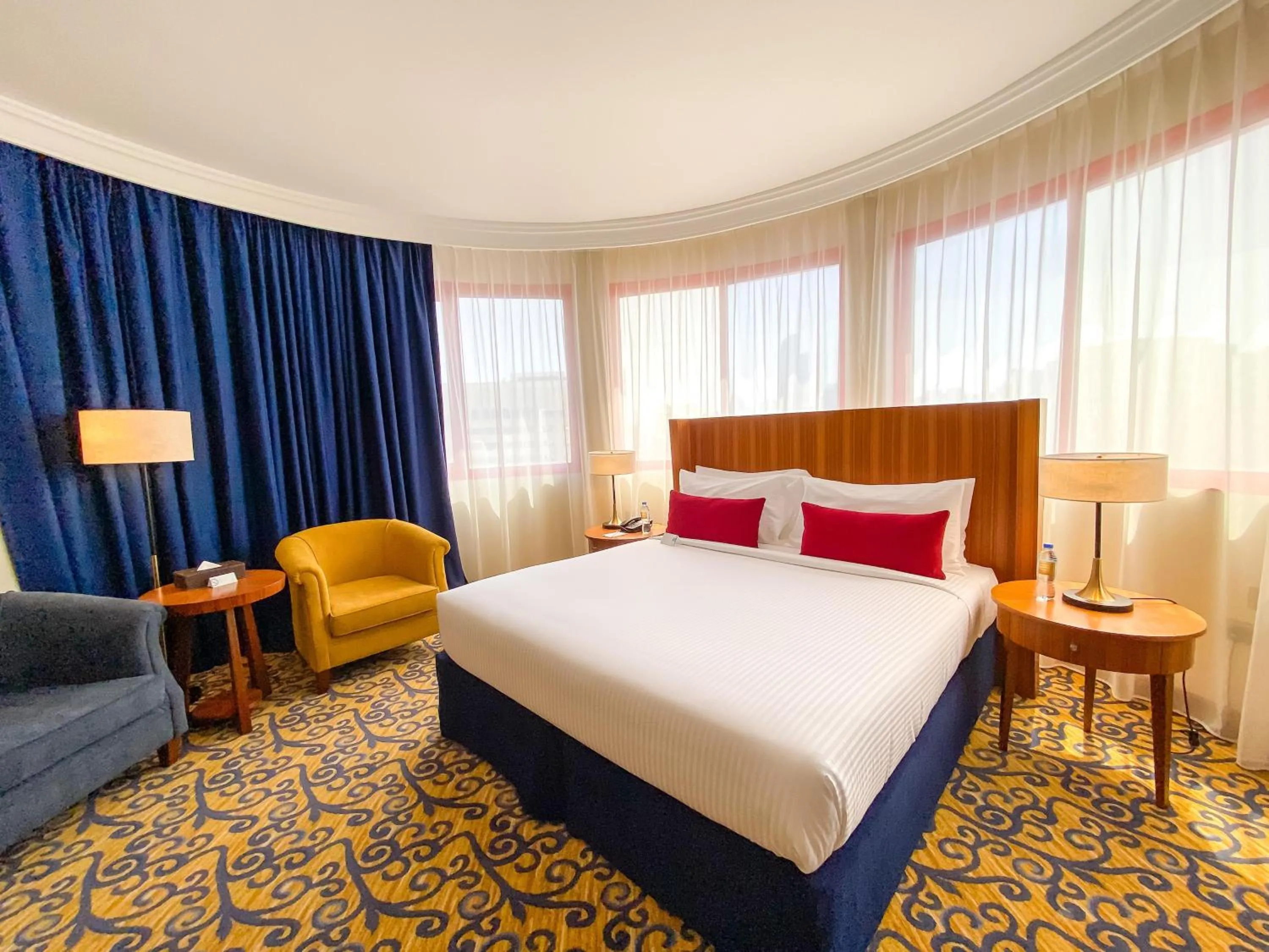 Bed in City Seasons Al Hamra Hotel