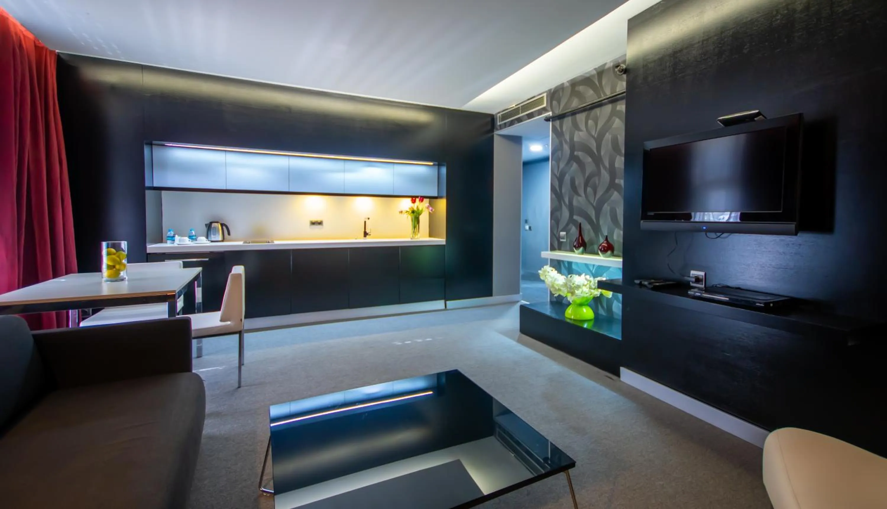 Communal lounge/ TV room in Vernazza Suites