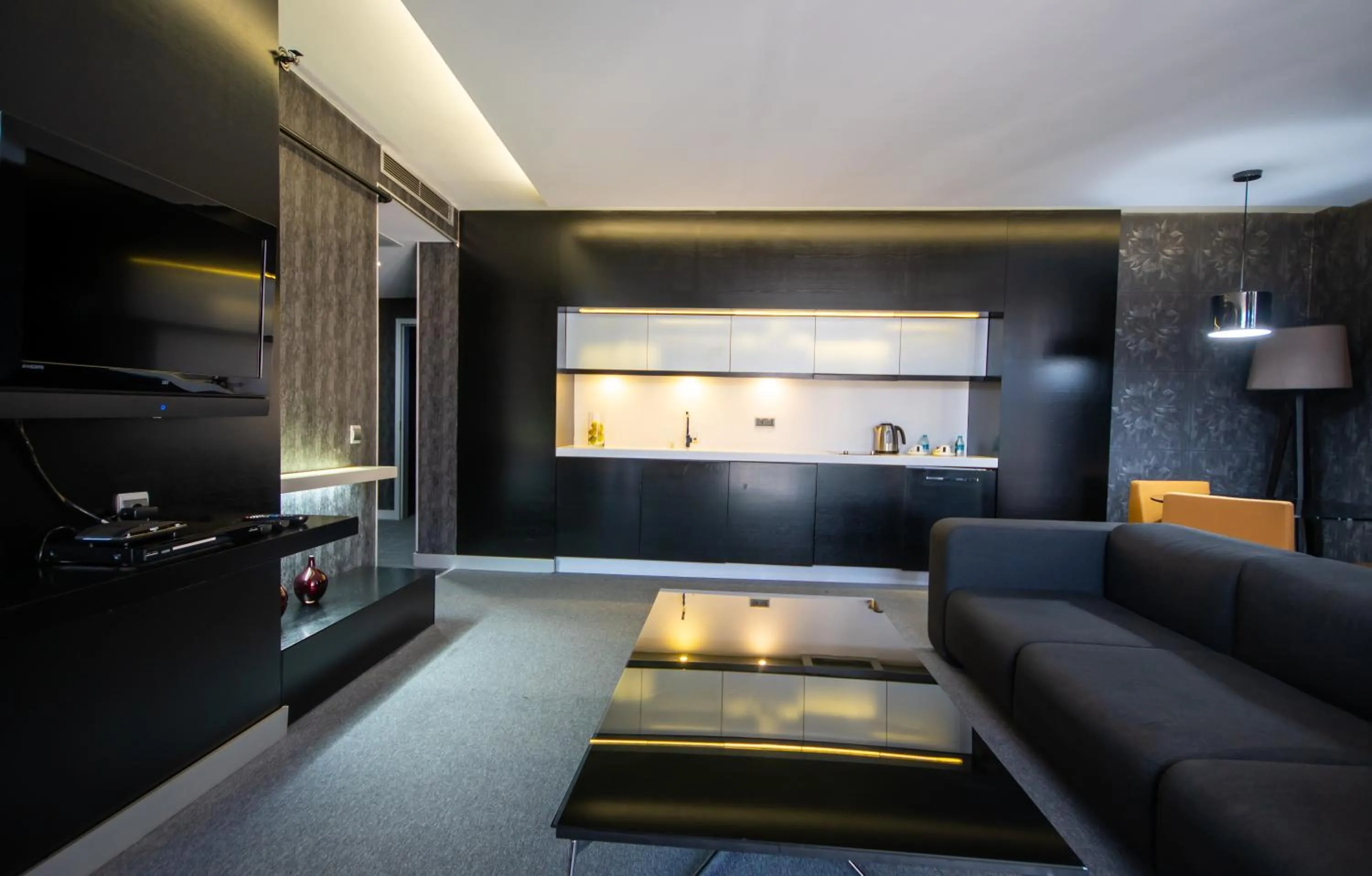 Communal lounge/ TV room in Vernazza Suites