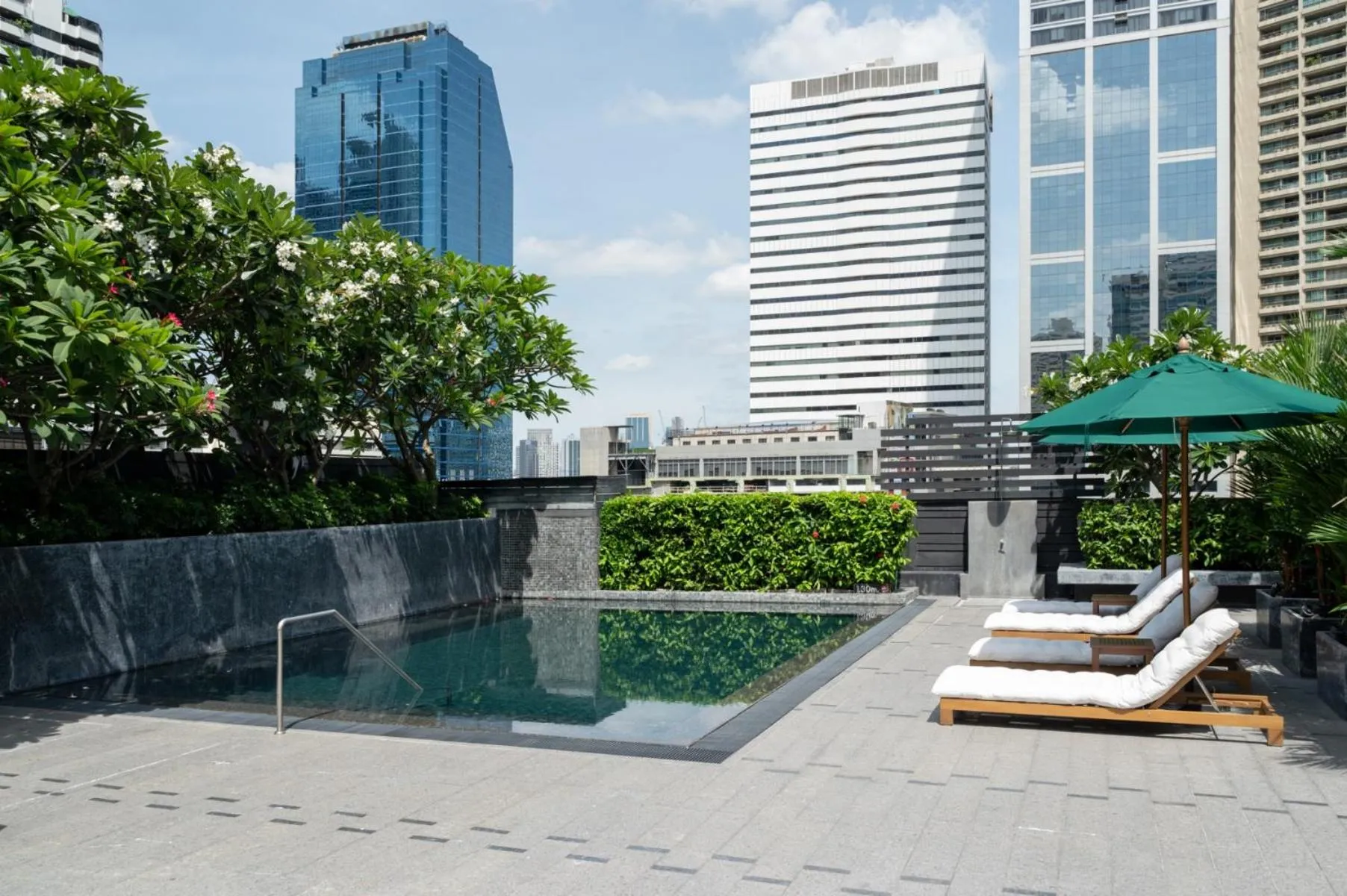 Swimming pool in Maitria Hotel Sukhumvit 18 Bangkok – A Chatrium Collection