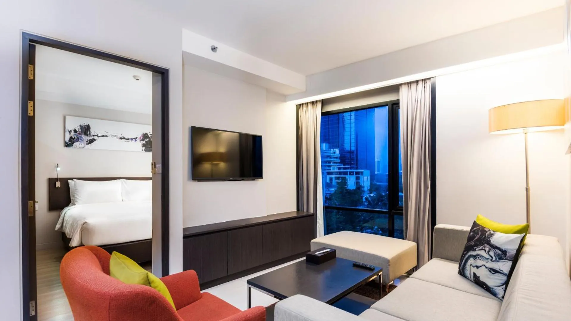 Living room, Bed in Maitria Hotel Sukhumvit 18 Bangkok – A Chatrium Collection