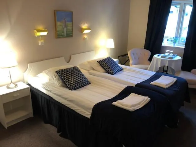 Bed in Hotell Turistgården i Simrishamn