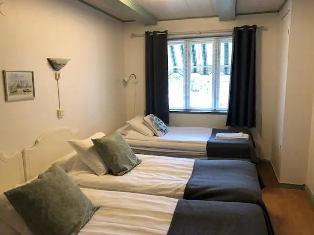 Bed in Hotell Turistgården i Simrishamn