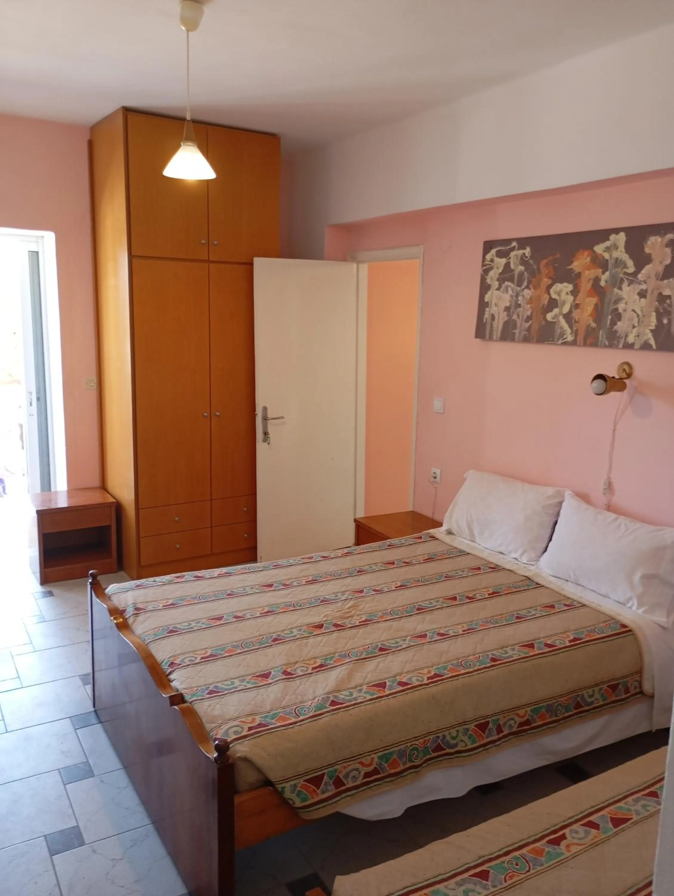 Bed in Denise Apartments Kefalos