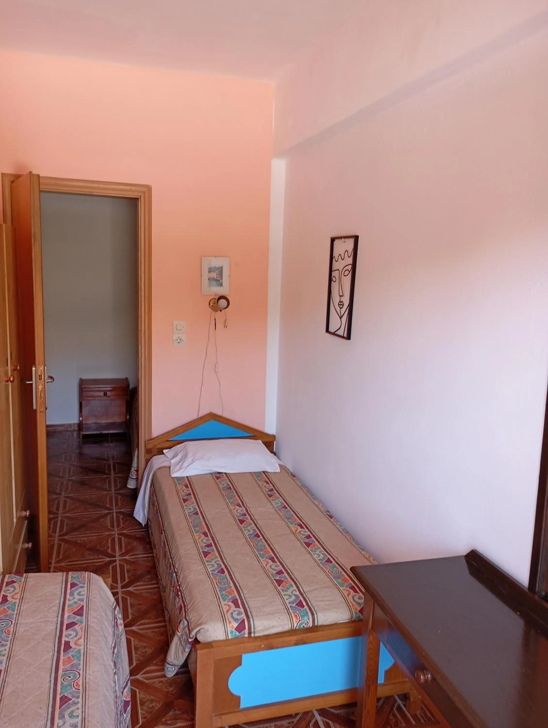 Bed in Denise Apartments Kefalos