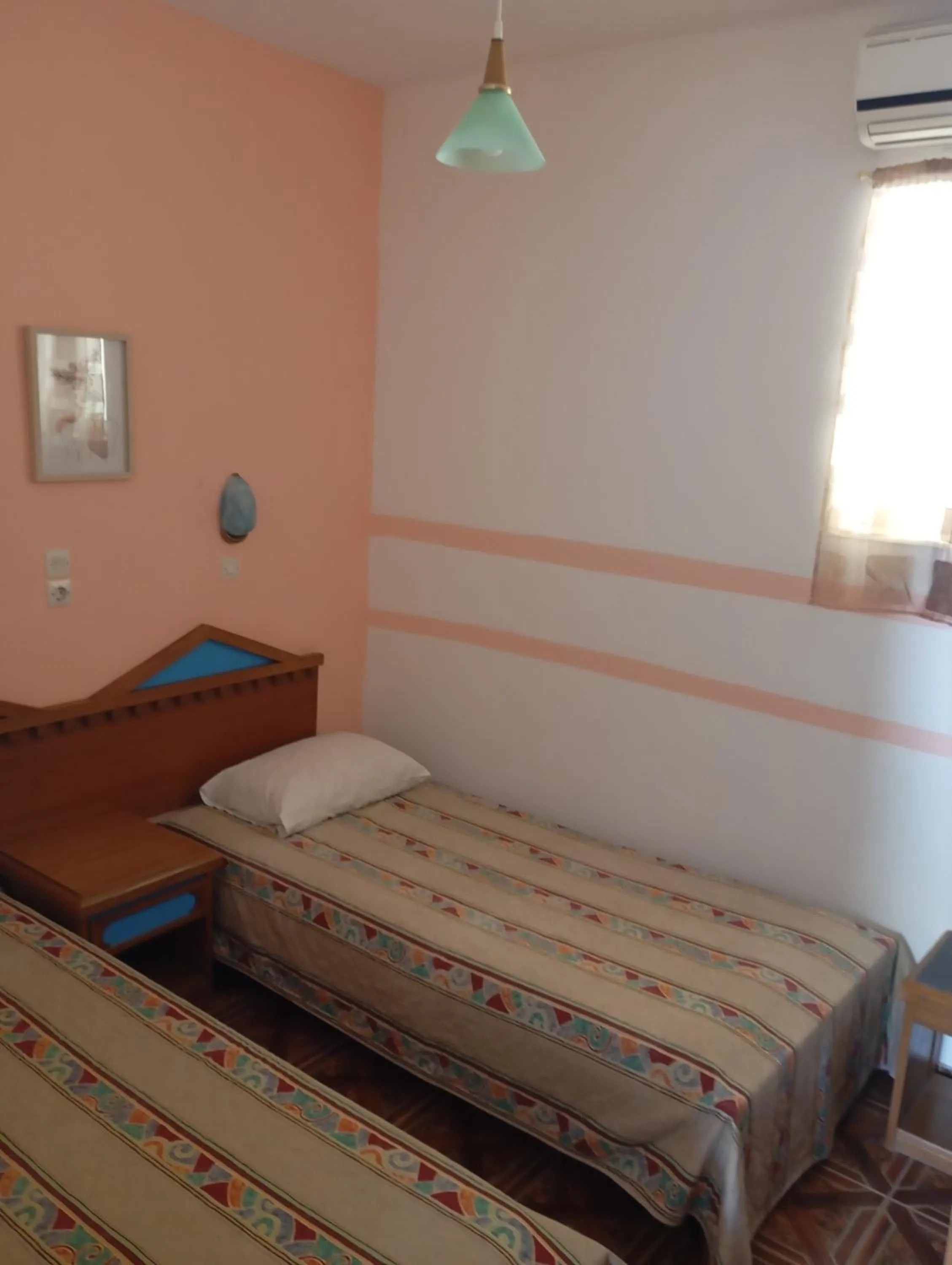 Bed in Denise Apartments Kefalos