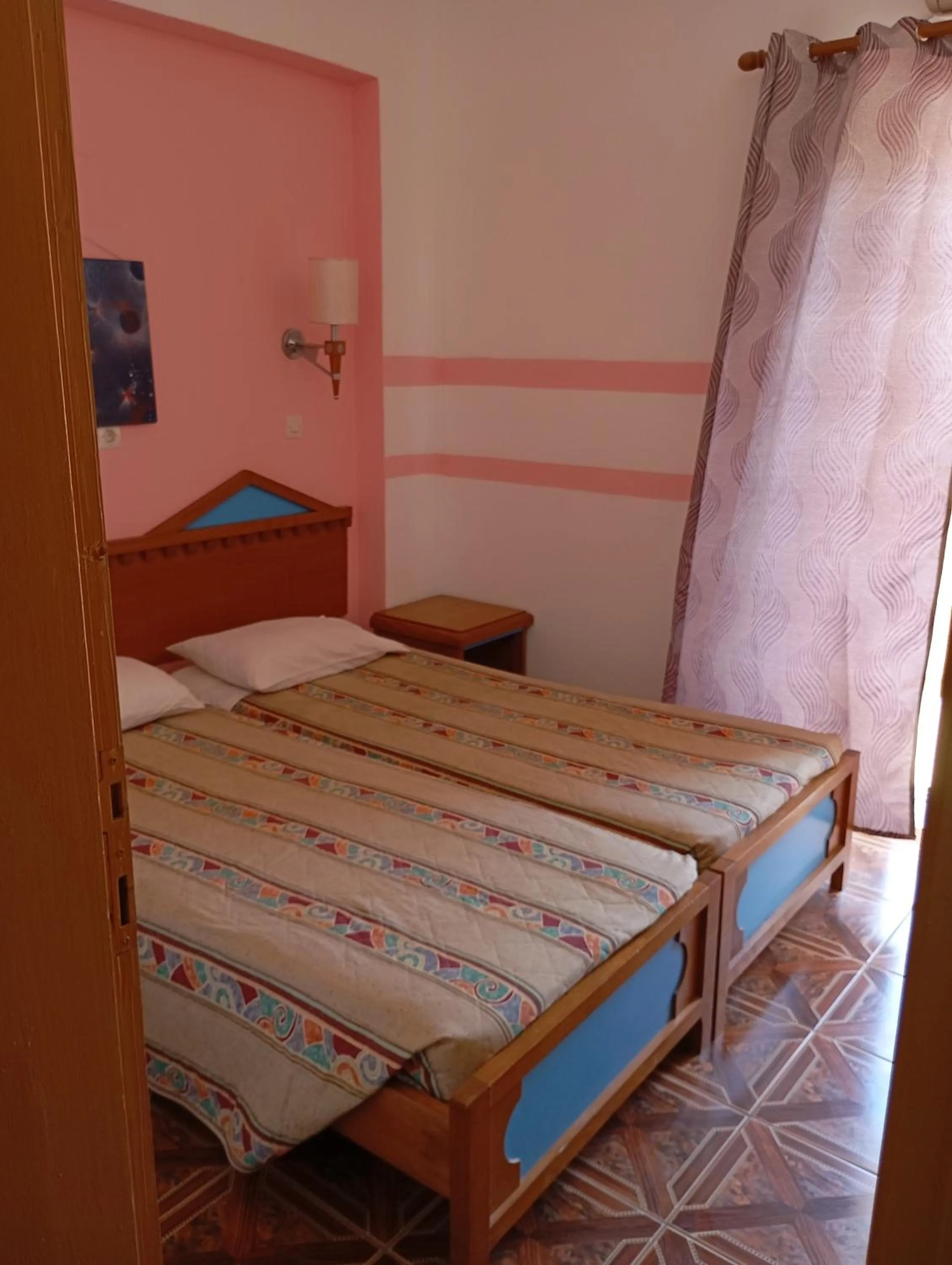 Bed in Denise Apartments Kefalos