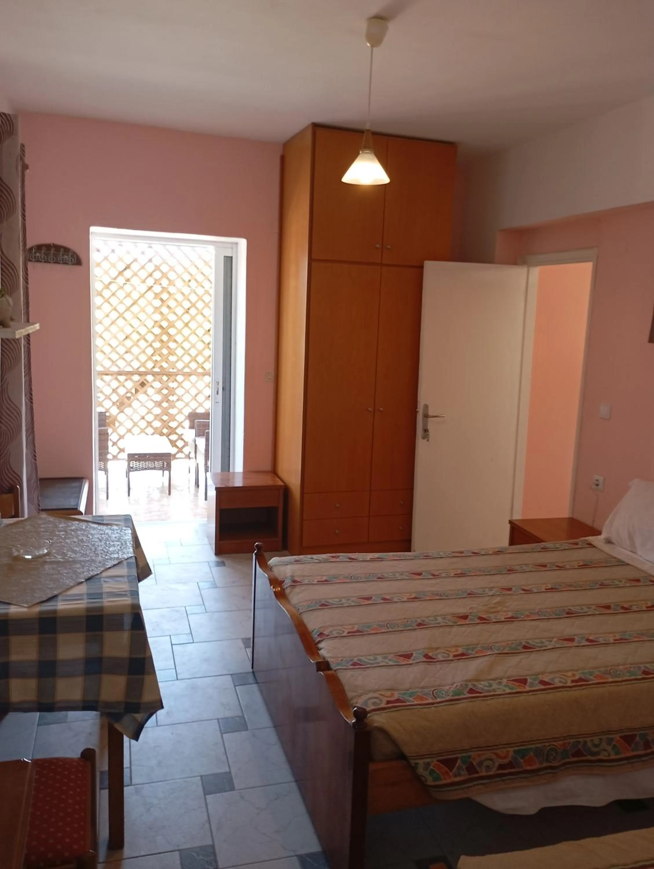 Bed in Denise Apartments Kefalos