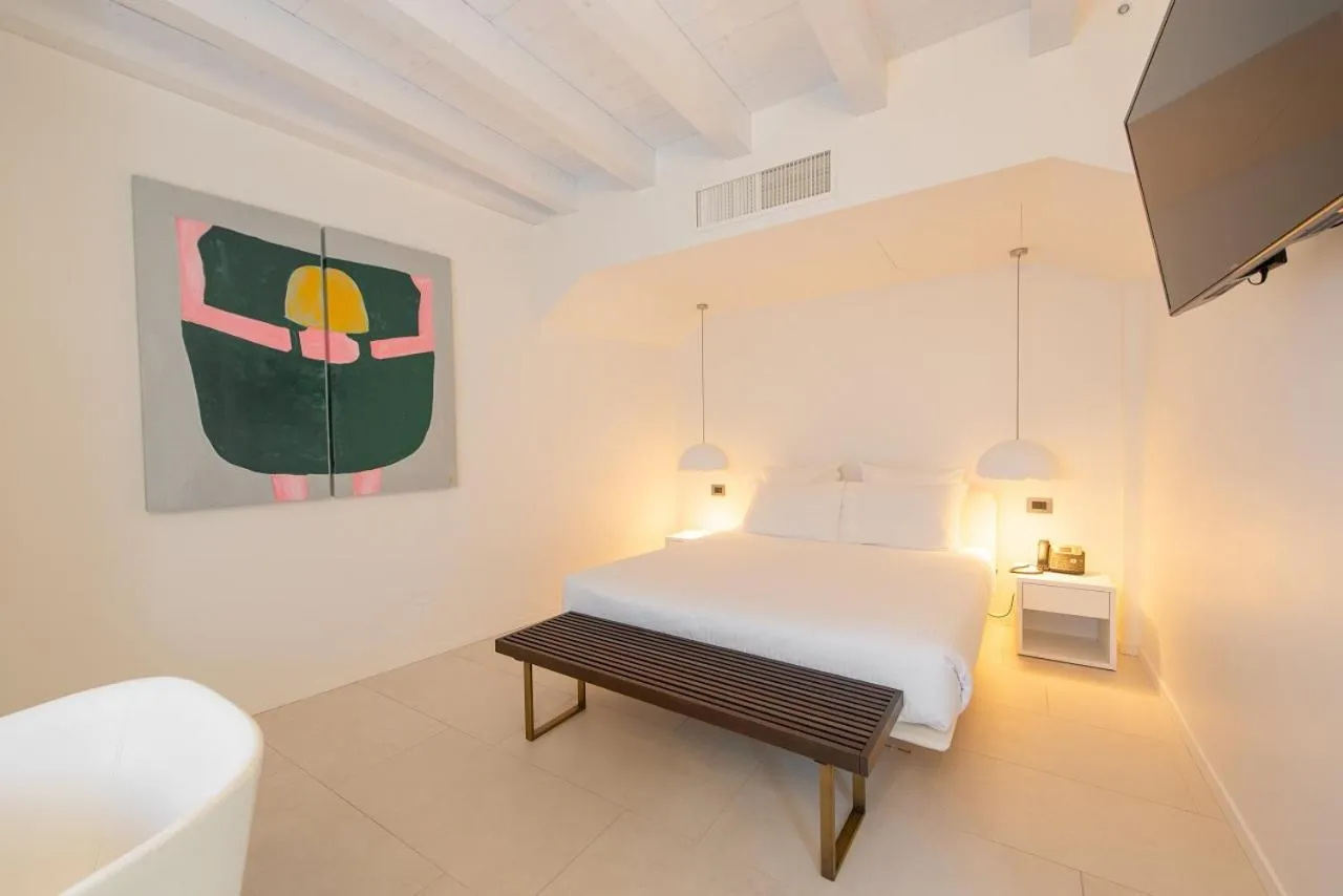 Bed in Le Funi Hotel