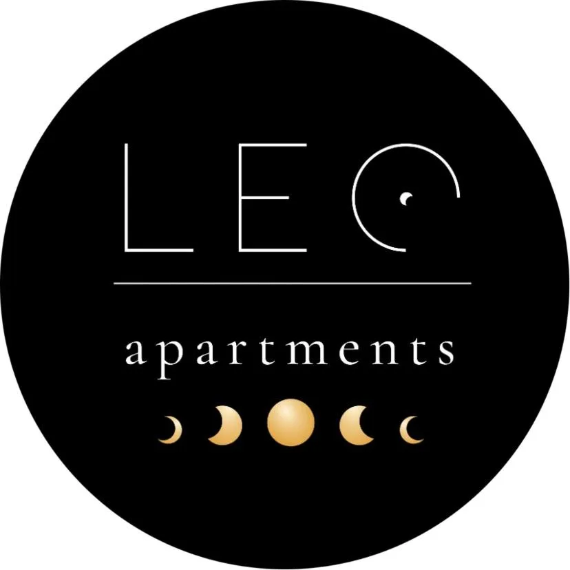 Property logo or sign in Leo Apartments Old Town
