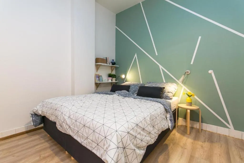 Bed in Apartments Stepanska 36