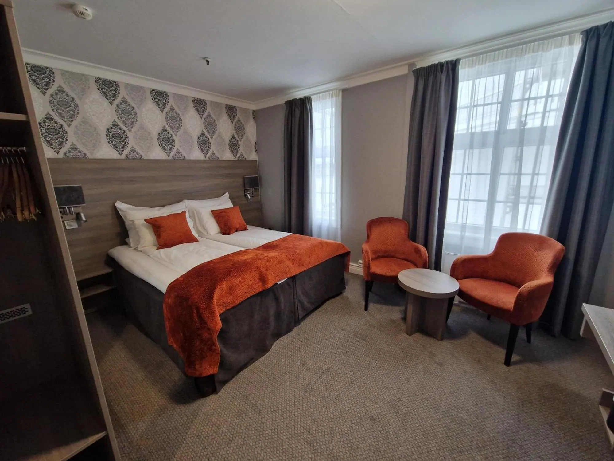 Bed in Dr. Holms Hotel