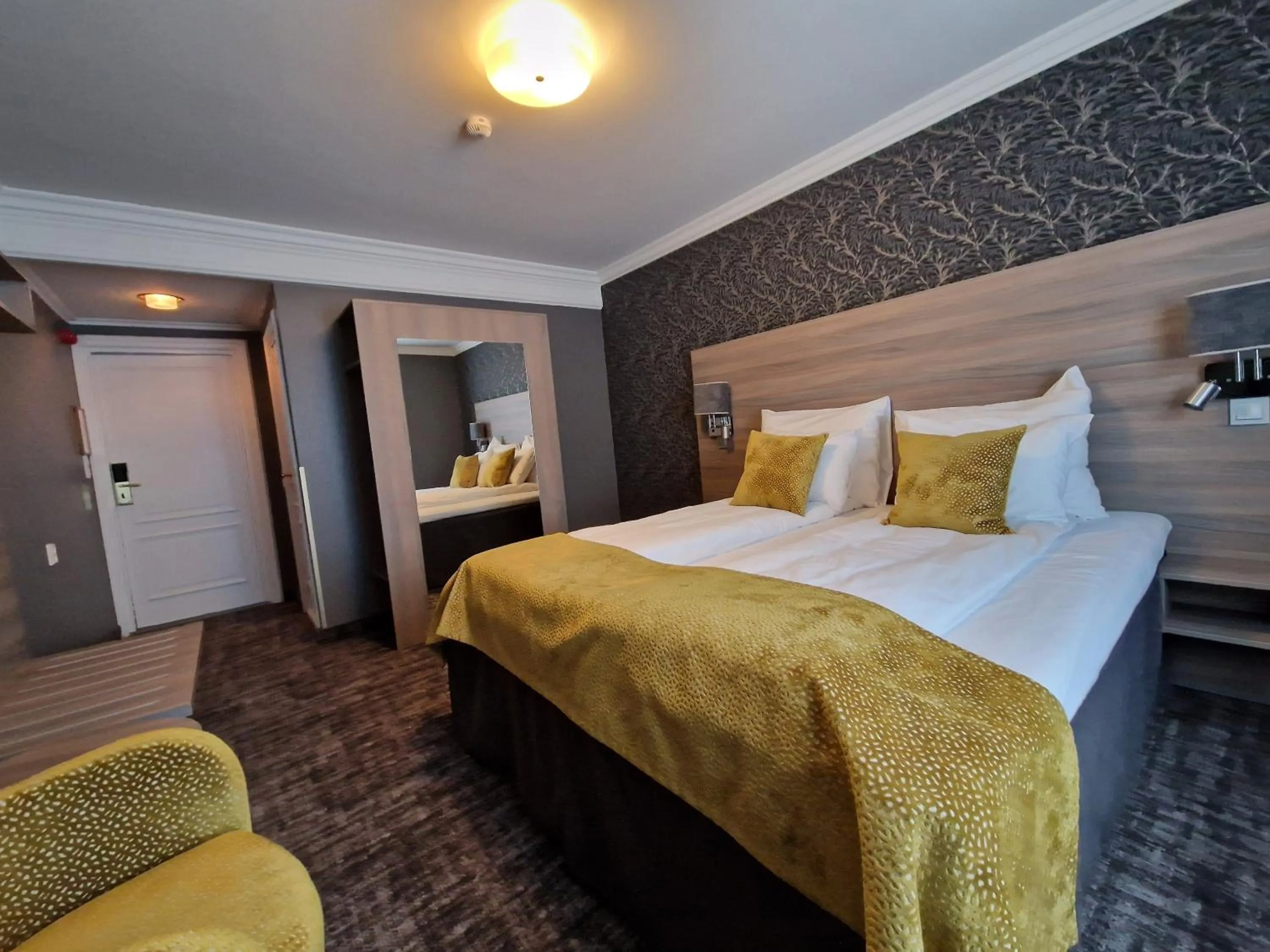 Bed in Dr. Holms Hotel