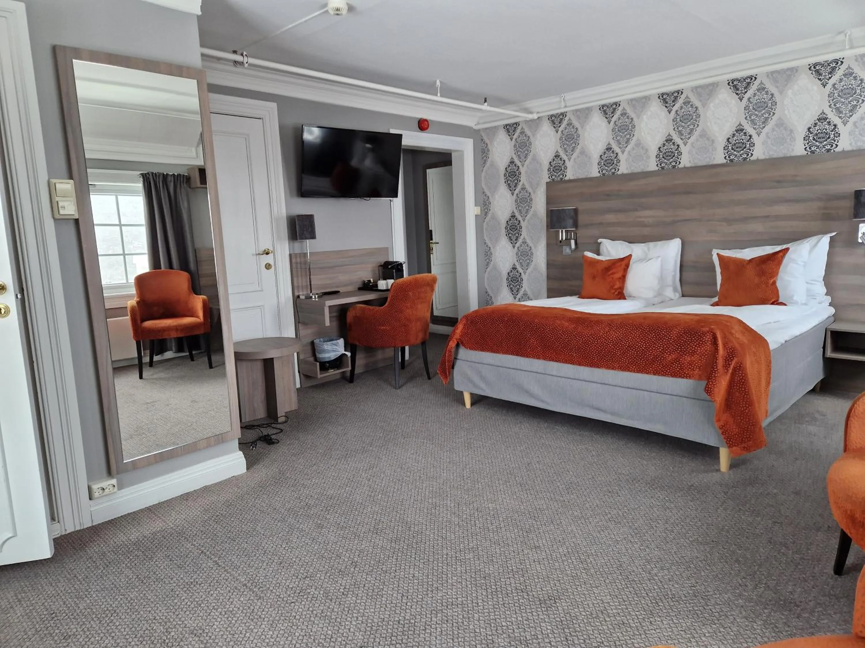 Bed in Dr. Holms Hotel