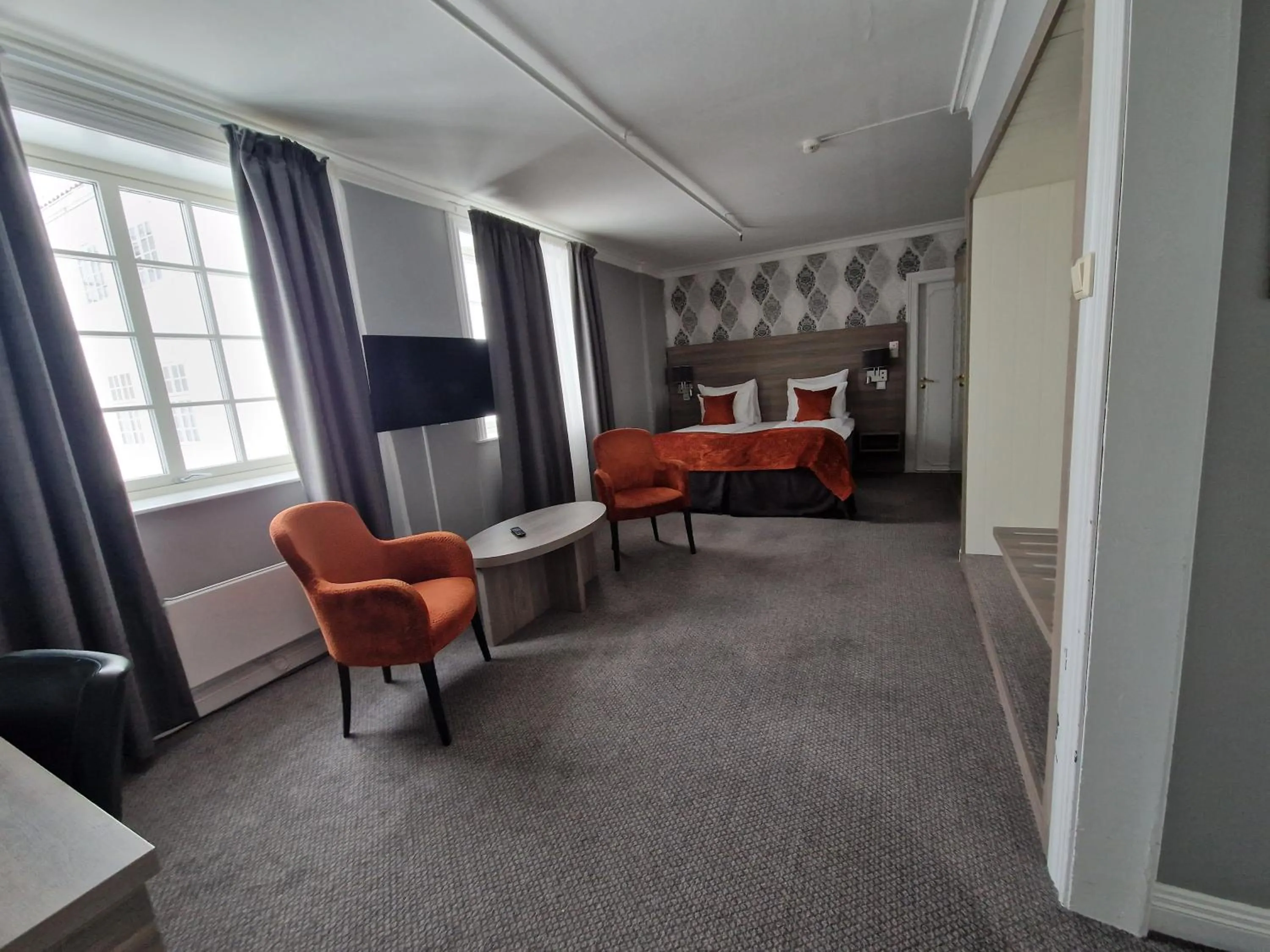 Bed in Dr. Holms Hotel