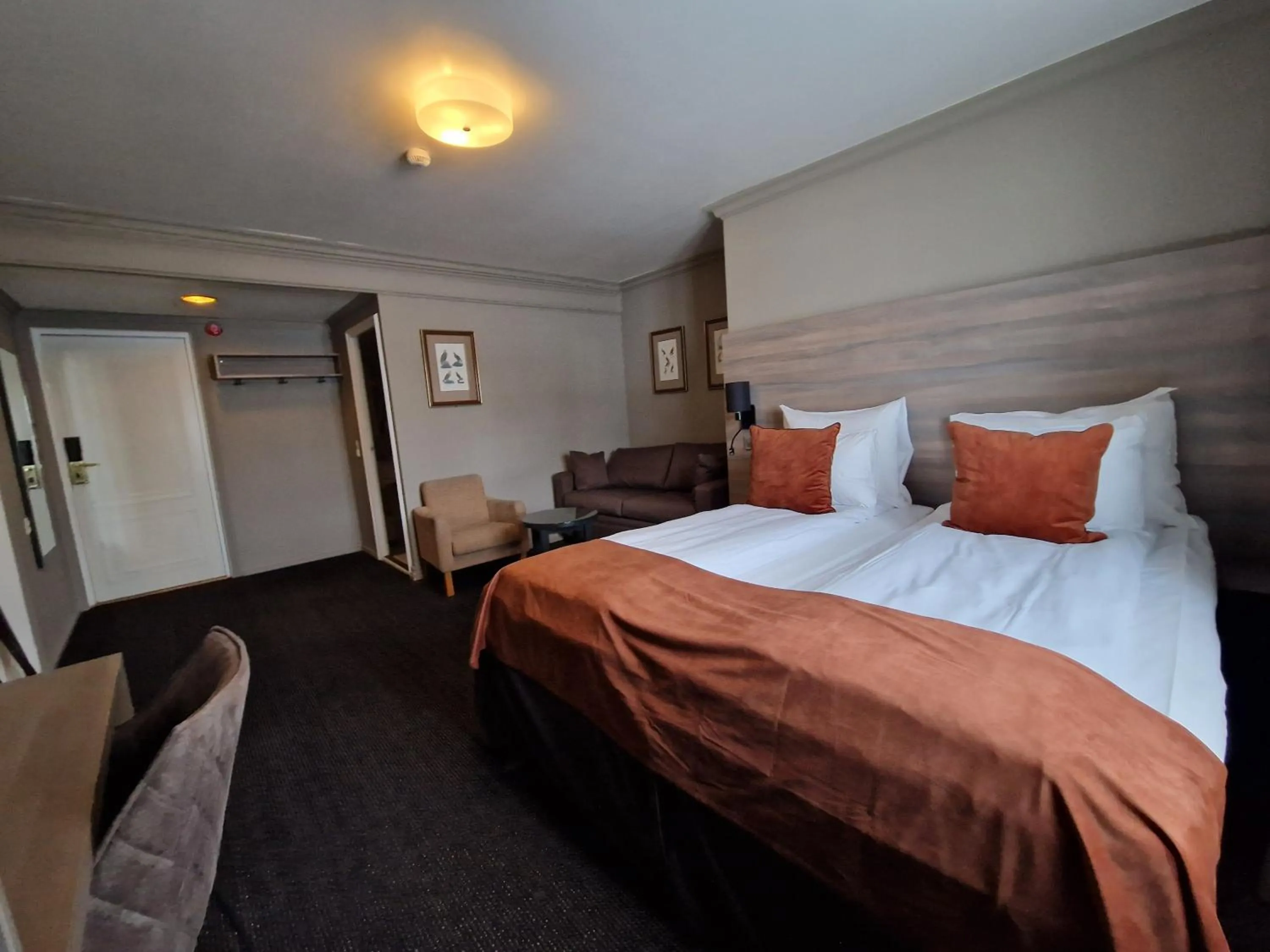 Bed in Dr. Holms Hotel