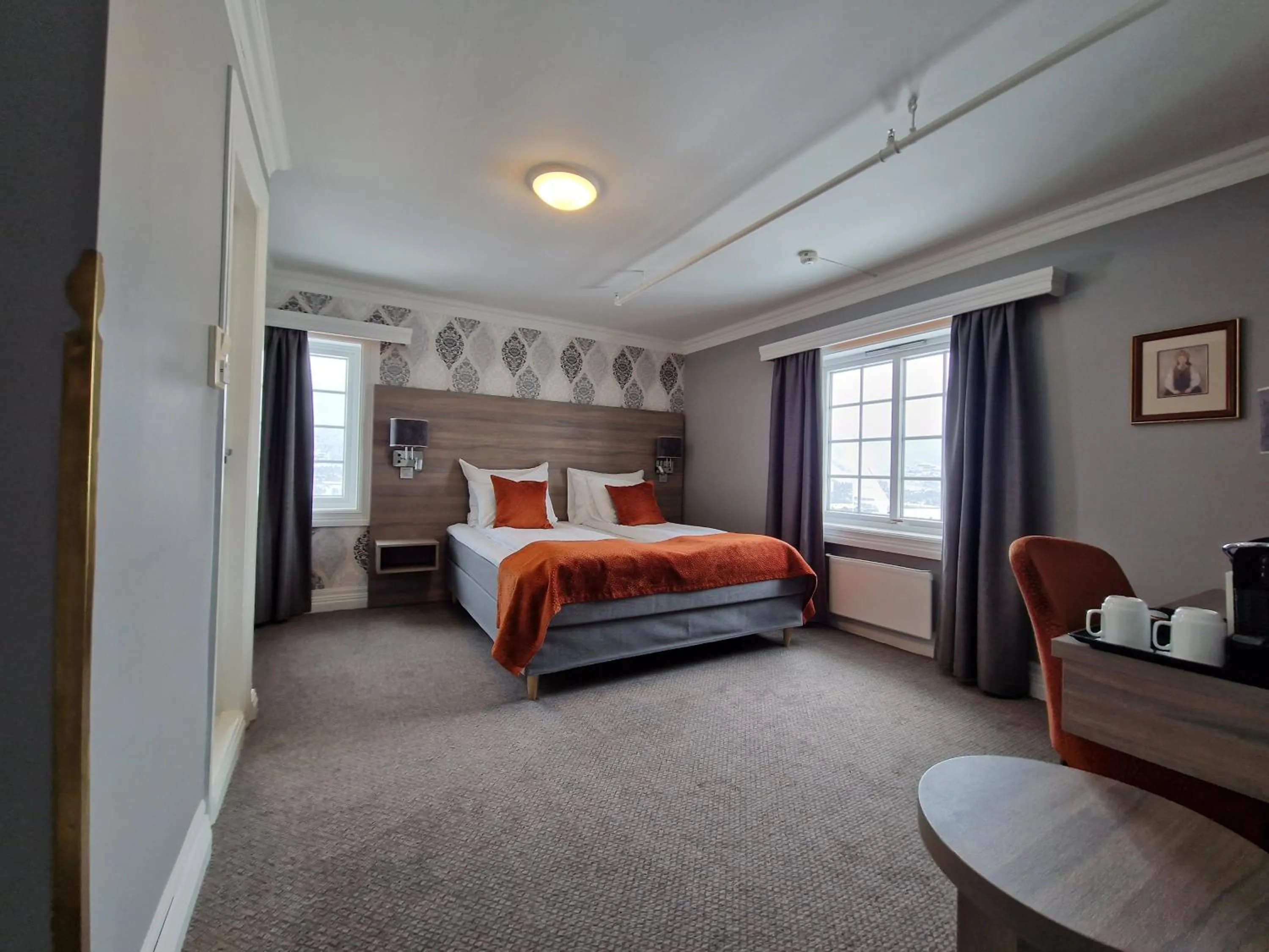 Bed in Dr. Holms Hotel