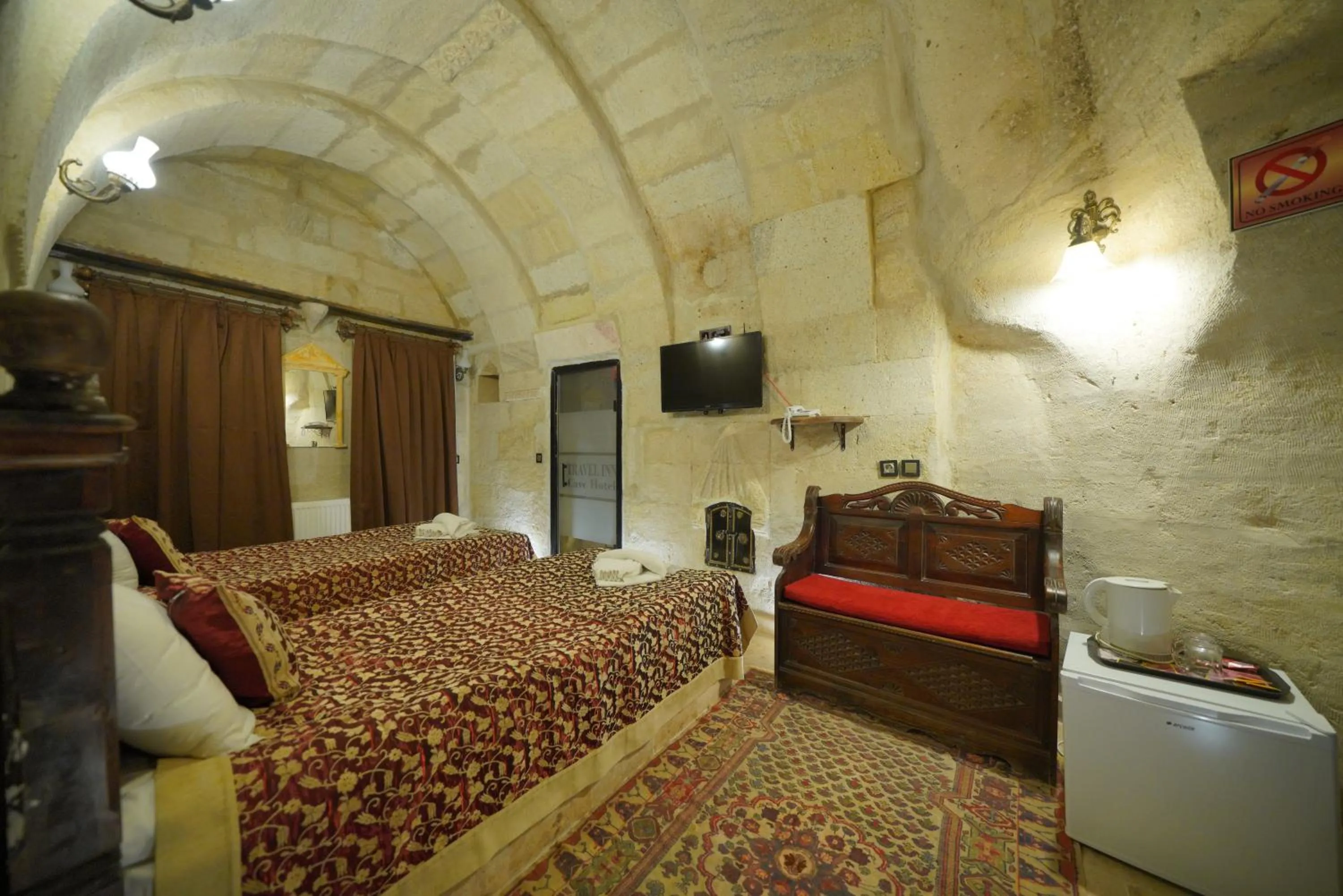 Bed in Travel Inn Cave Hotel