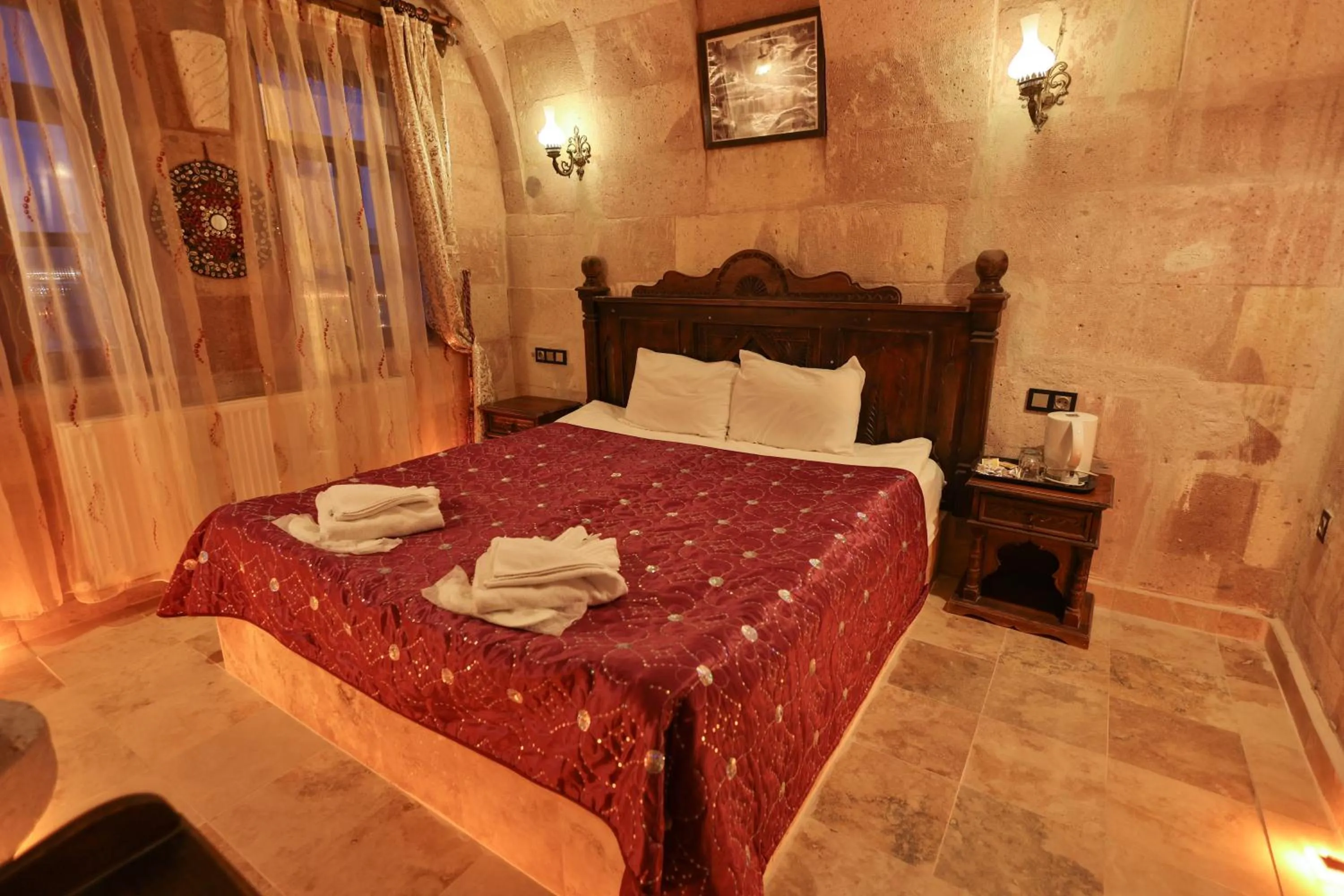 Bed in Travel Inn Cave Hotel