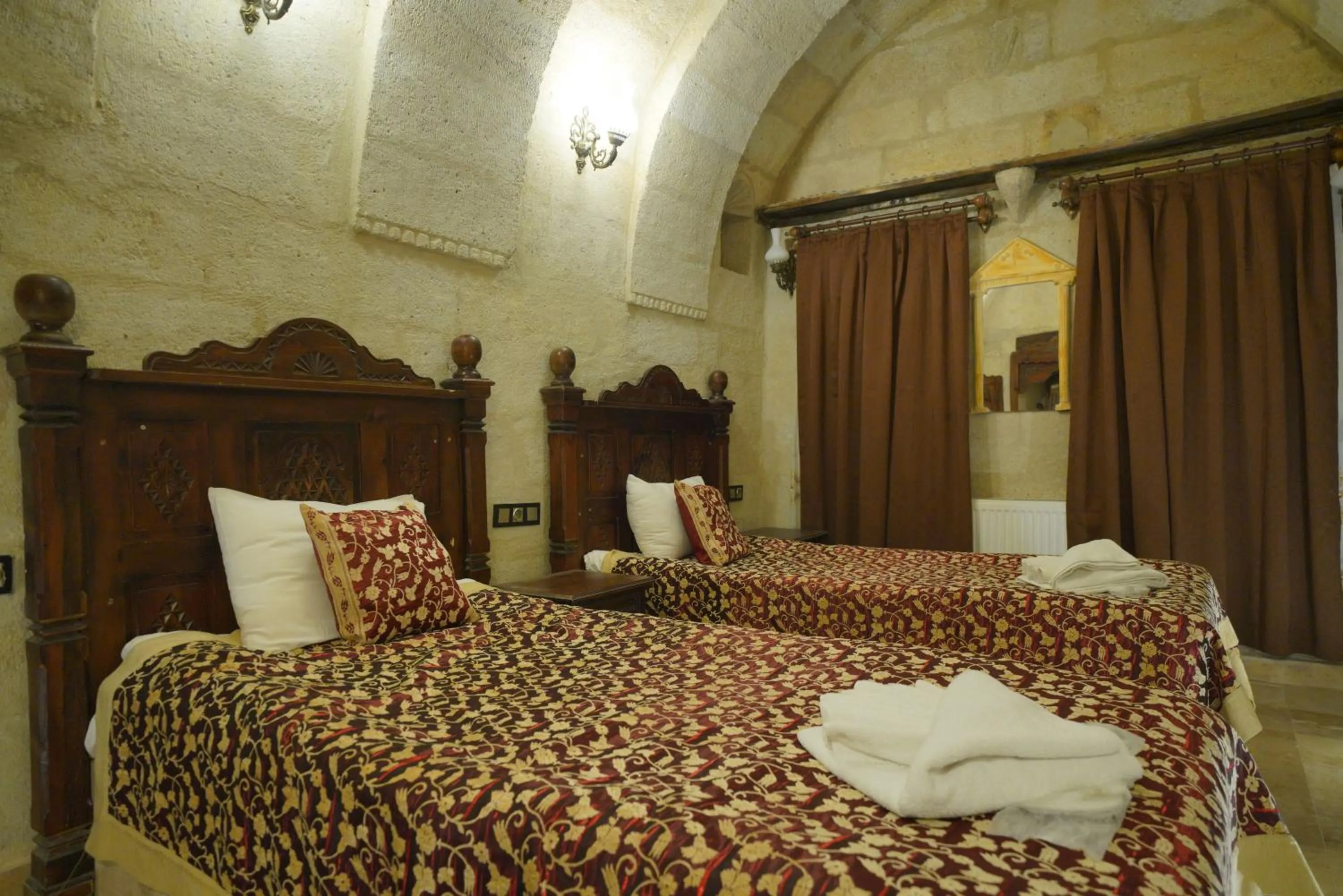 Bed in Travel Inn Cave Hotel