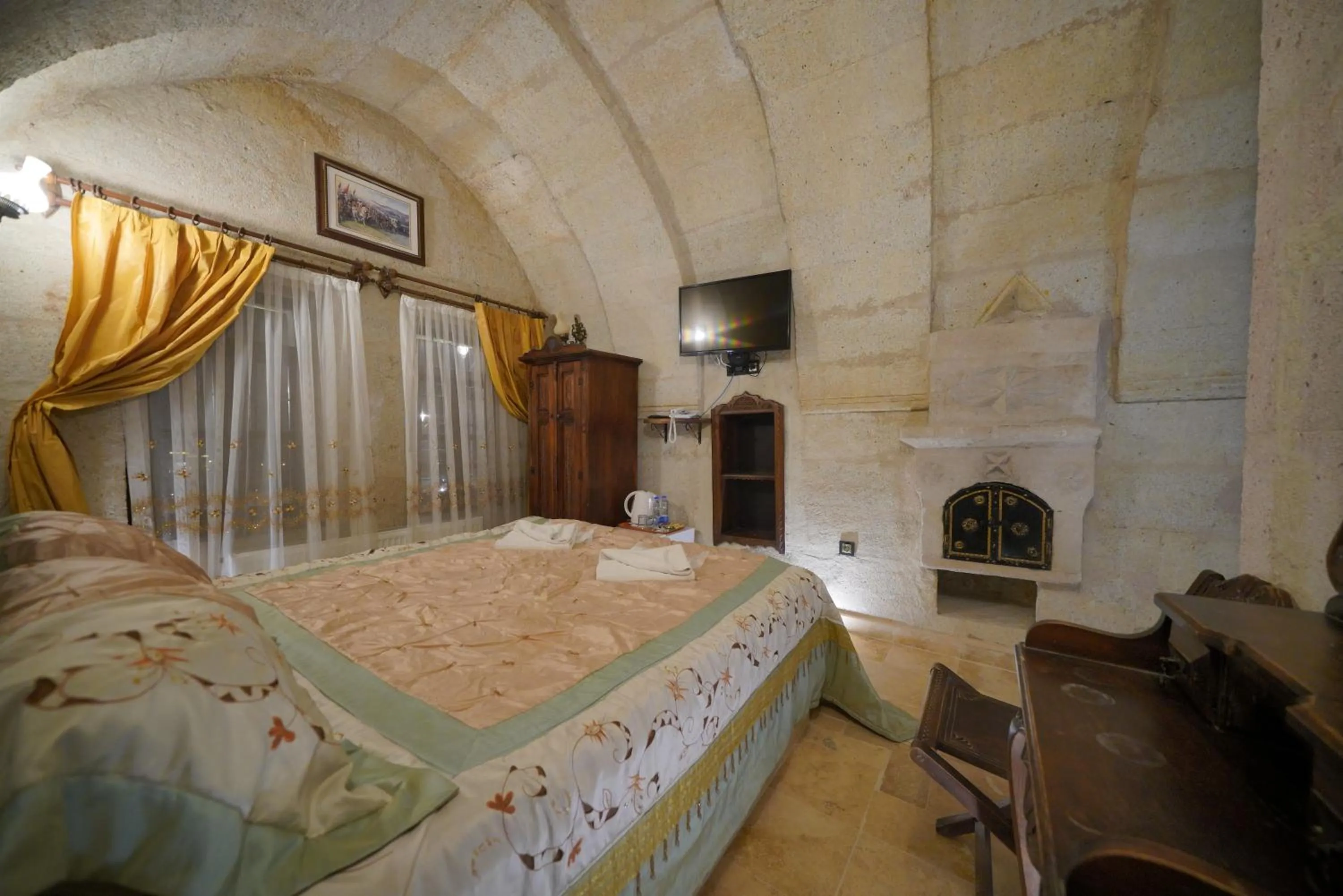 Bed in Travel Inn Cave Hotel