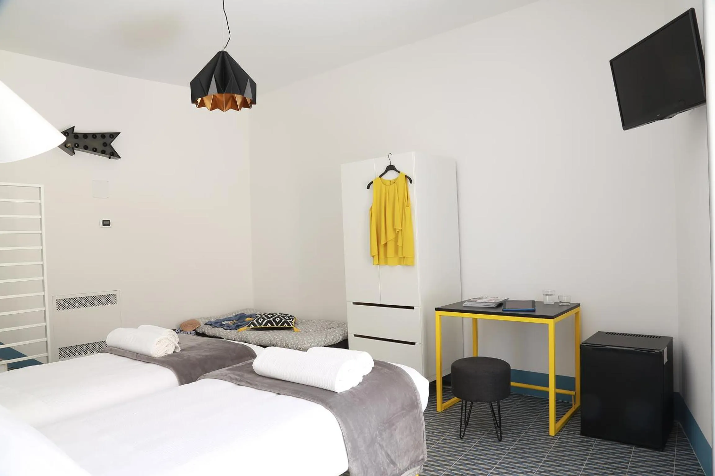 Bed in Intervallo Boutique Hotel