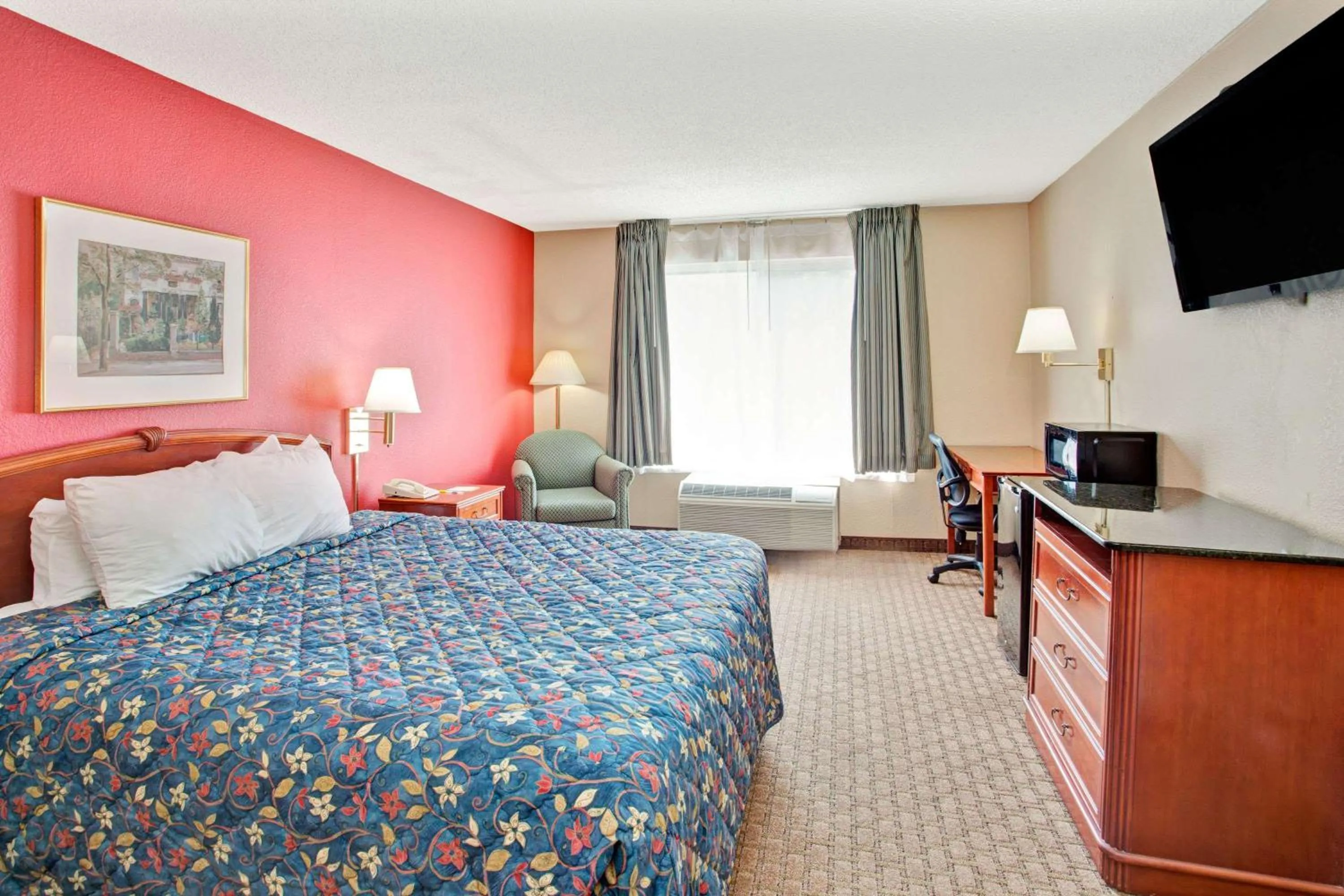 Photo of the whole room, Bed in Days Inn by Wyndham Marietta-Atlanta-Delk Road