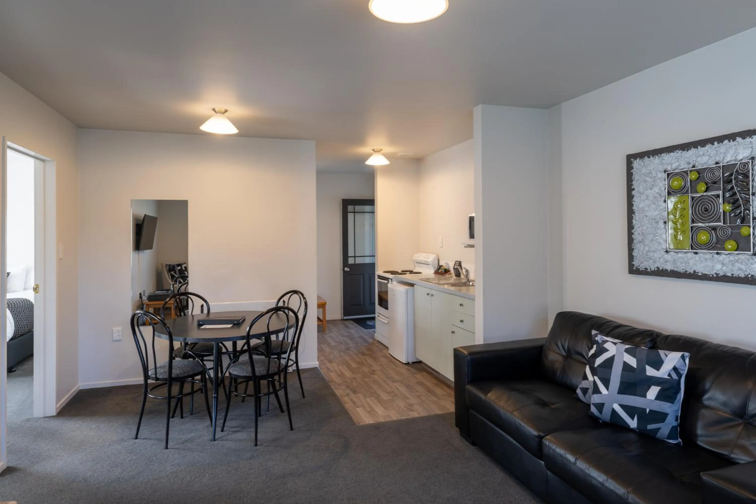 Living room in ASURE Gables Motor Lodge