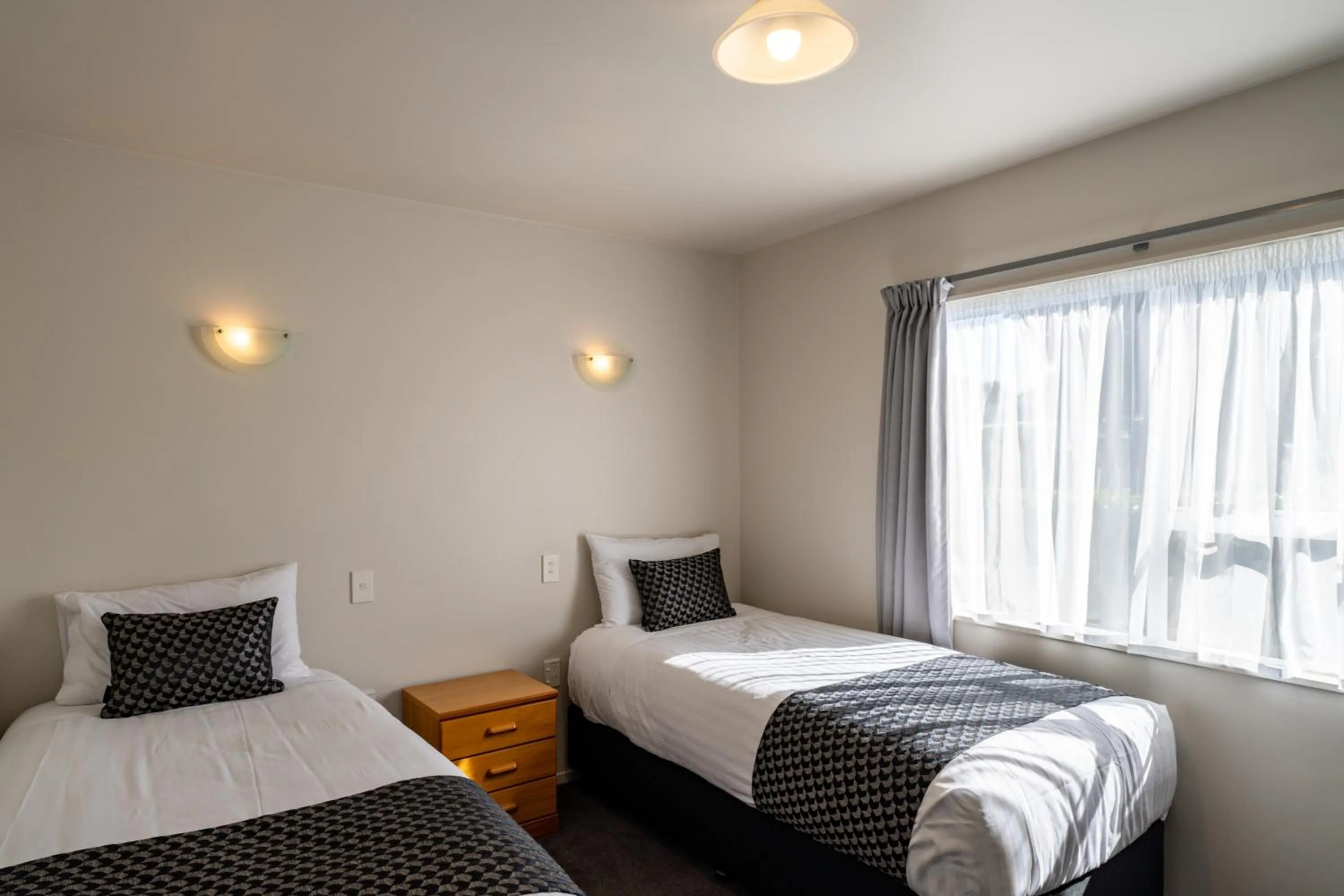 Bedroom, Bed in ASURE Gables Motor Lodge