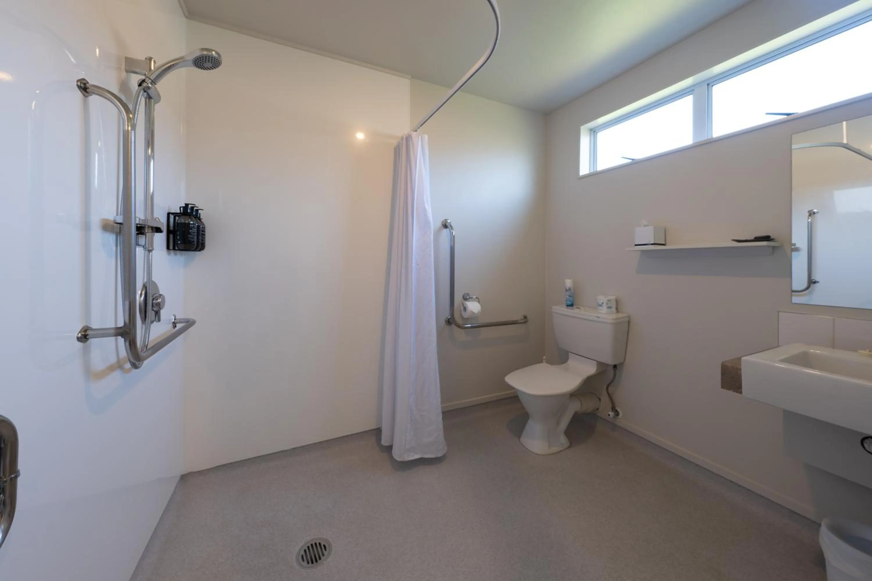 Toilet in ASURE Gables Motor Lodge