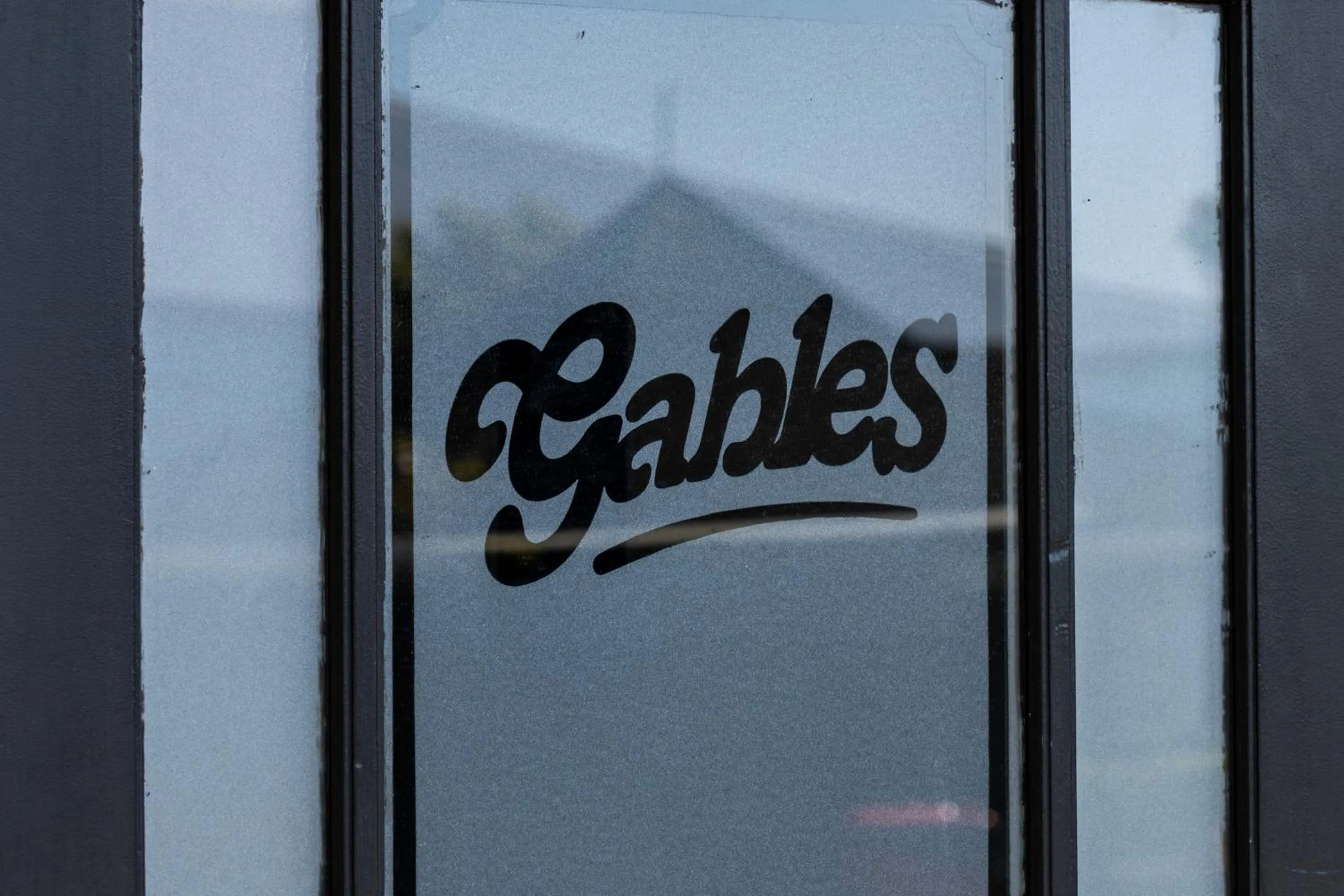 Logo/Certificate/Sign in ASURE Gables Motor Lodge