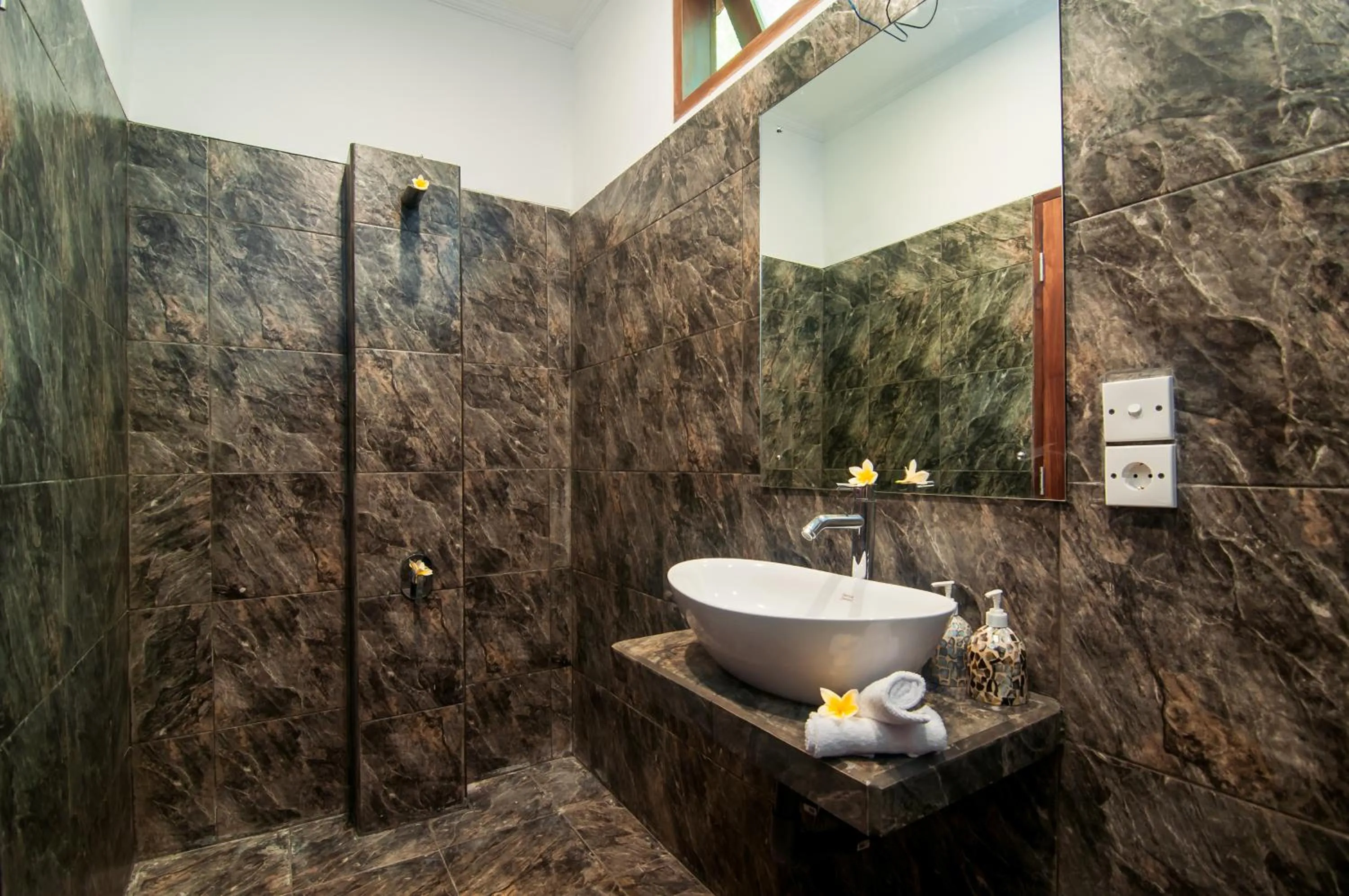 Bathroom in Mawar Estate by Villas Direct Bali