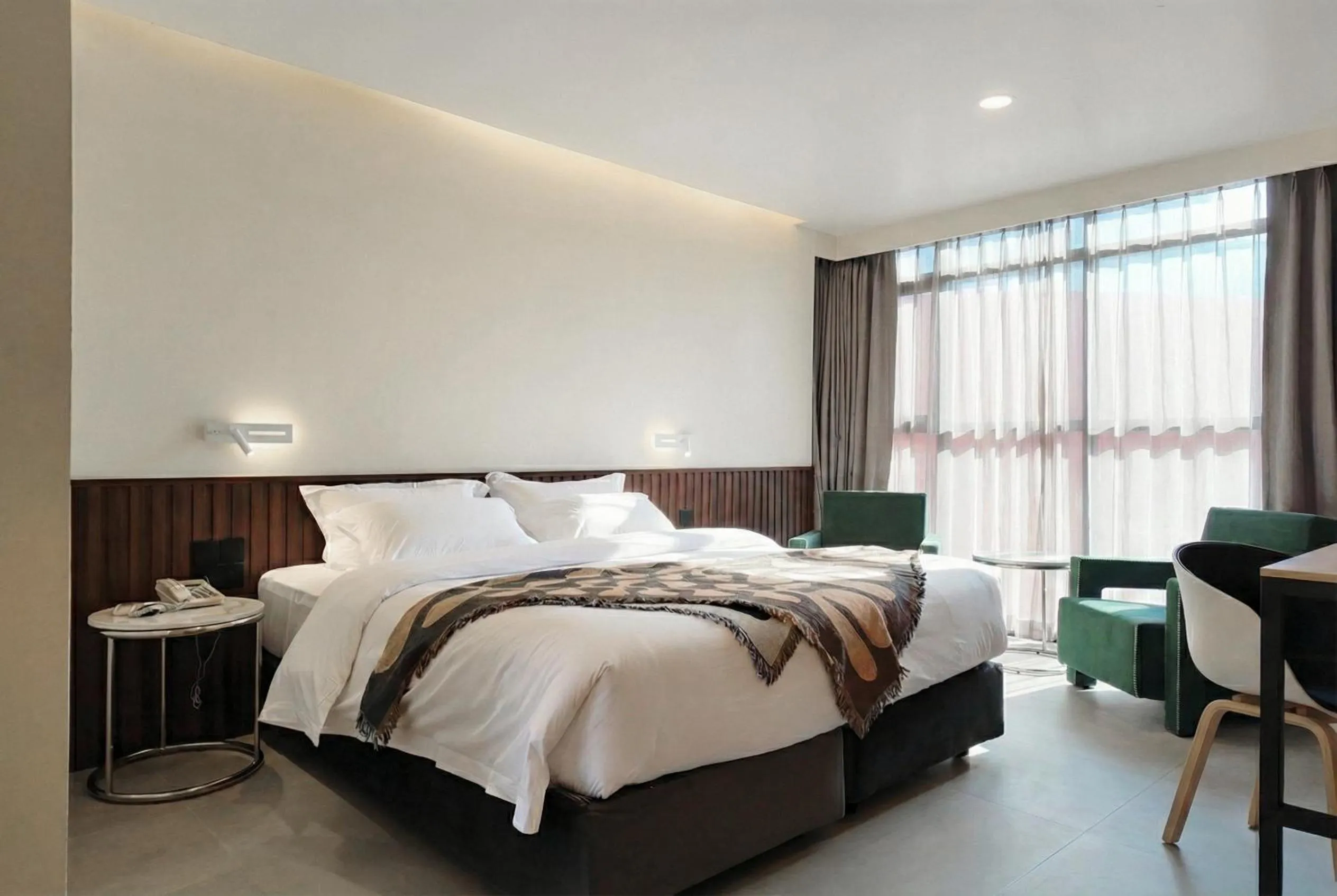 Bed in Grand Inn Hotel