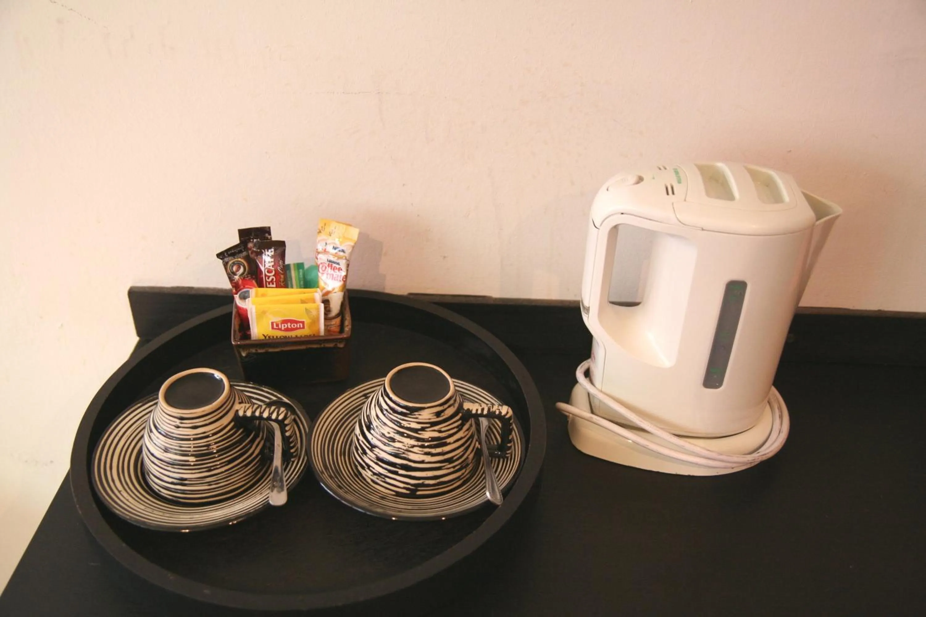 Coffee/tea facilities in Grand Inn Hotel