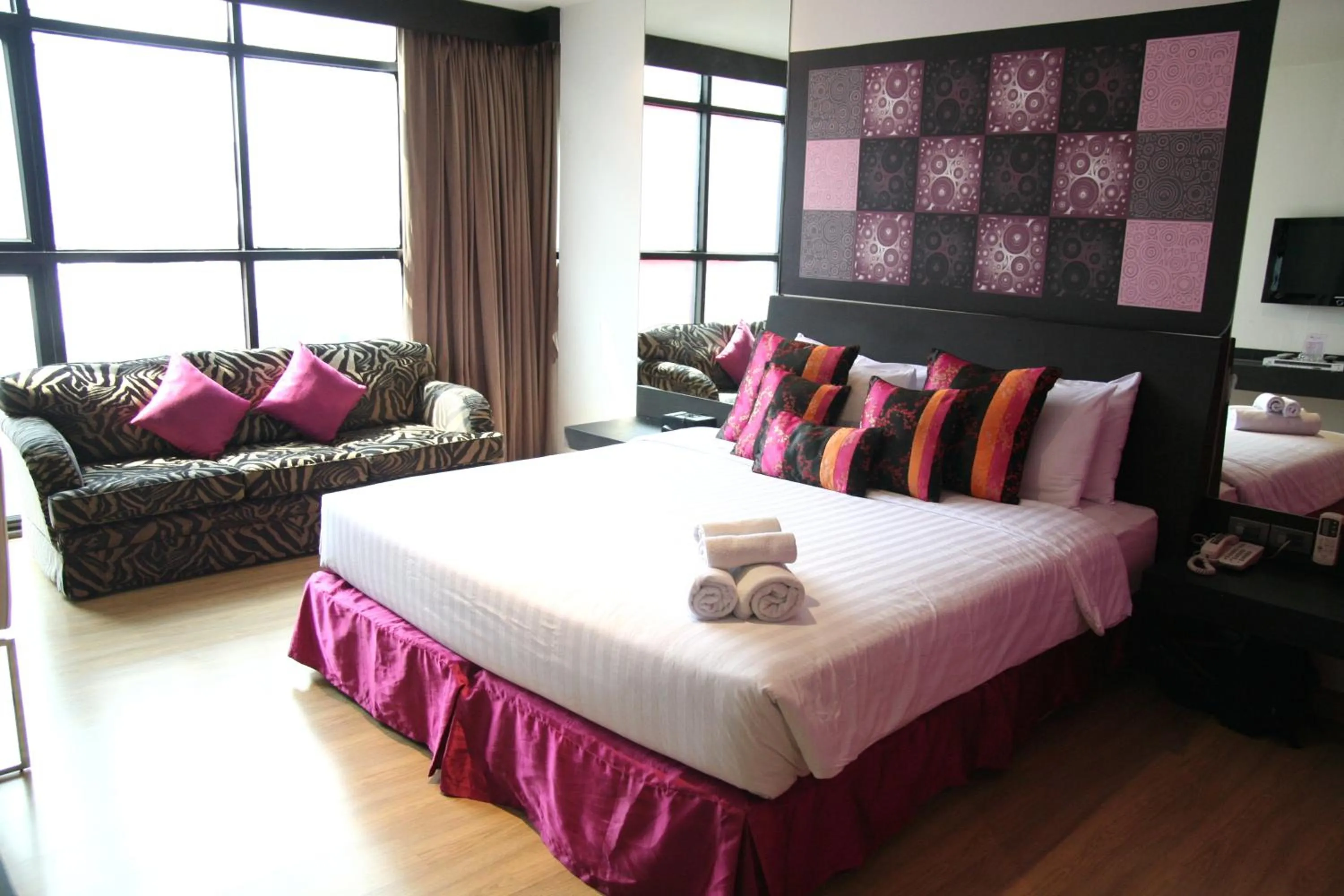 Bed in Grand Inn Hotel