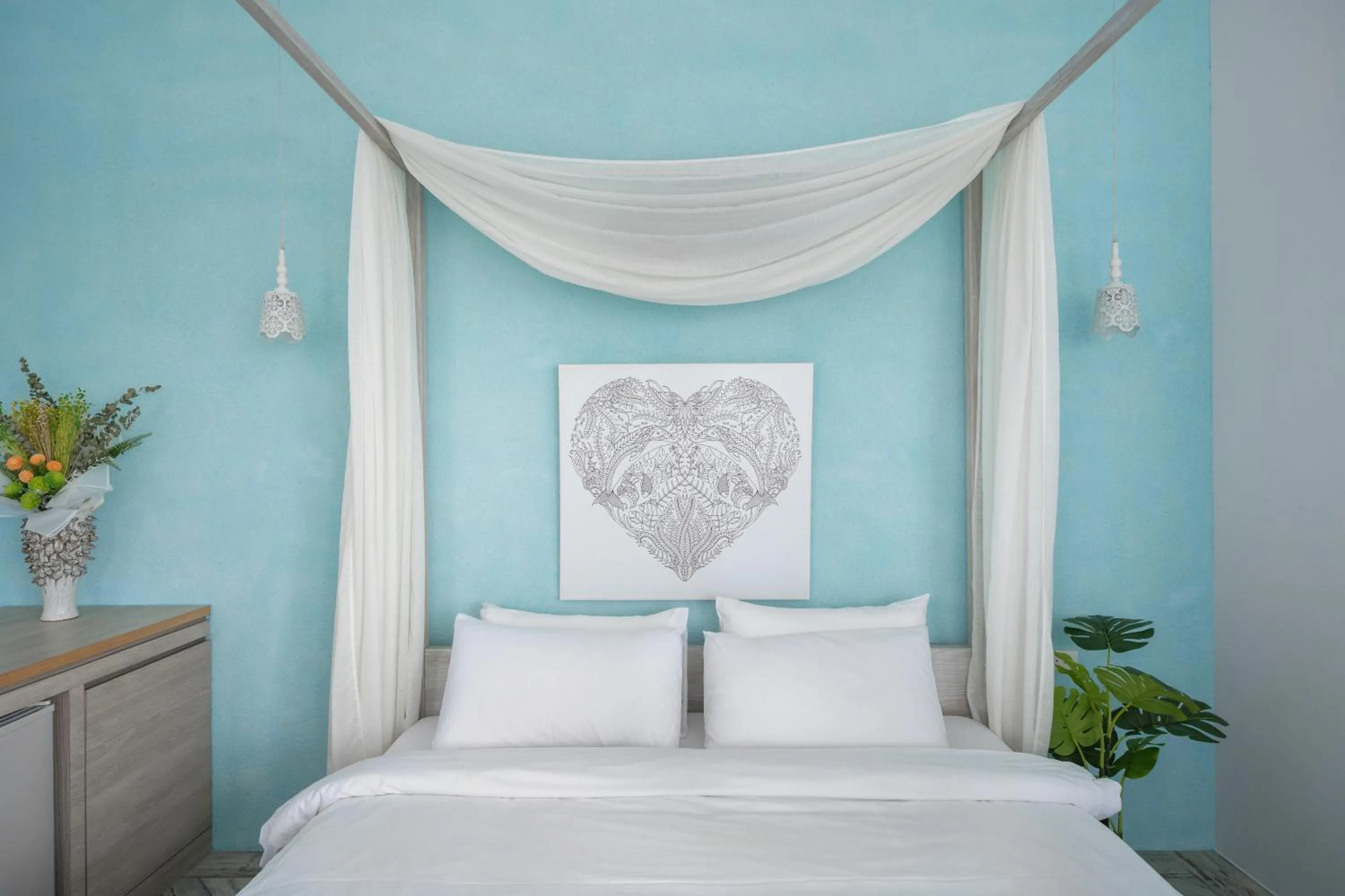 Bed in Color Coral Boutique Hotel